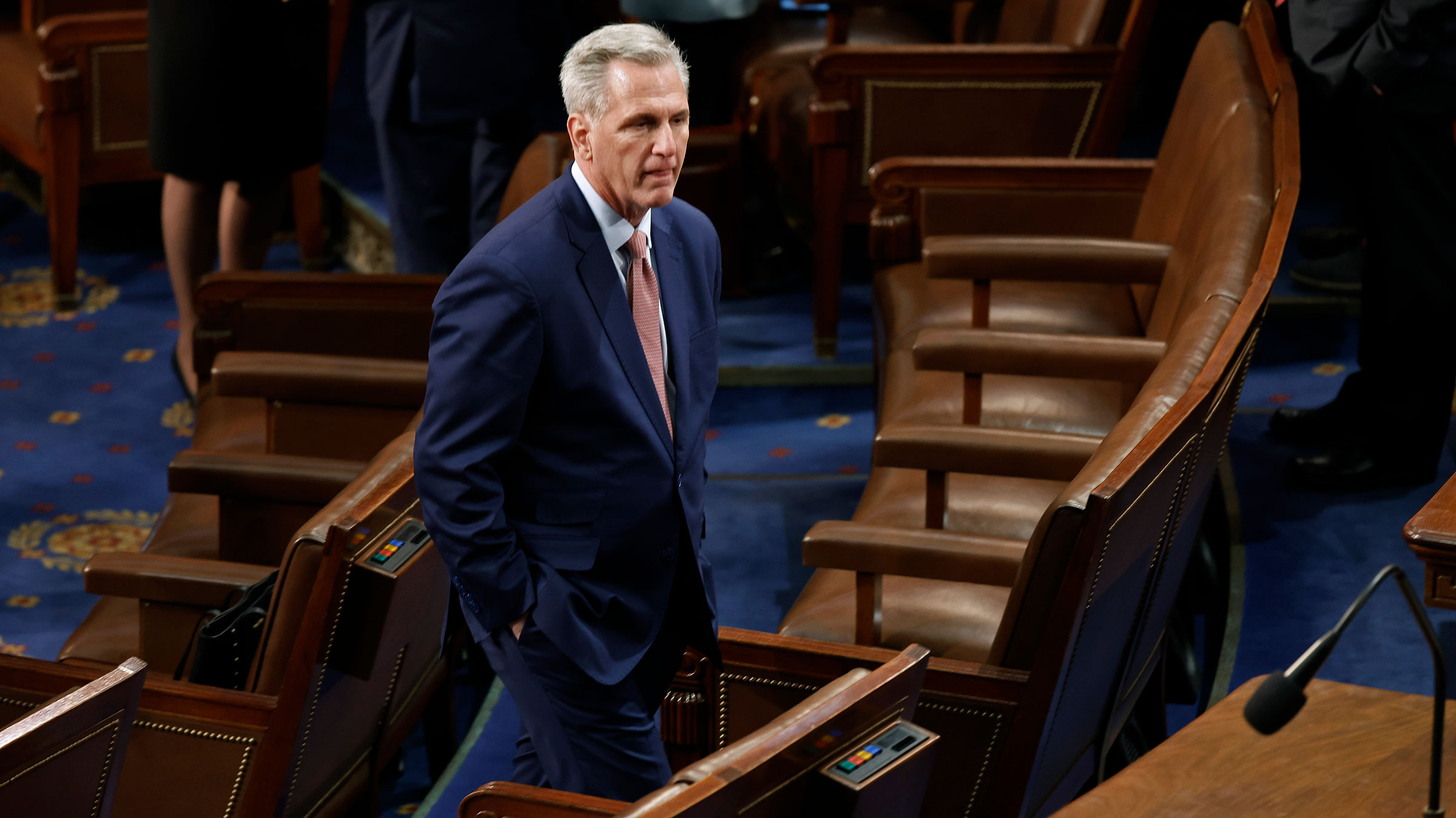 Kevin McCarthy moves through the House chamber between votes on Tuesday.
