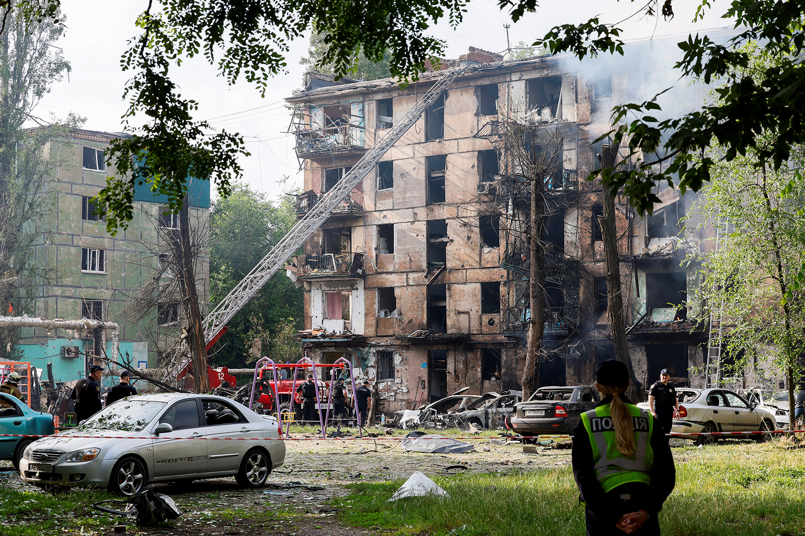 Rescuers work at a site of a residential building heavily damaged by a Russian missile strike in Kryvyi Rih, Dnipropetrovsk region, Ukraine, on June 13.