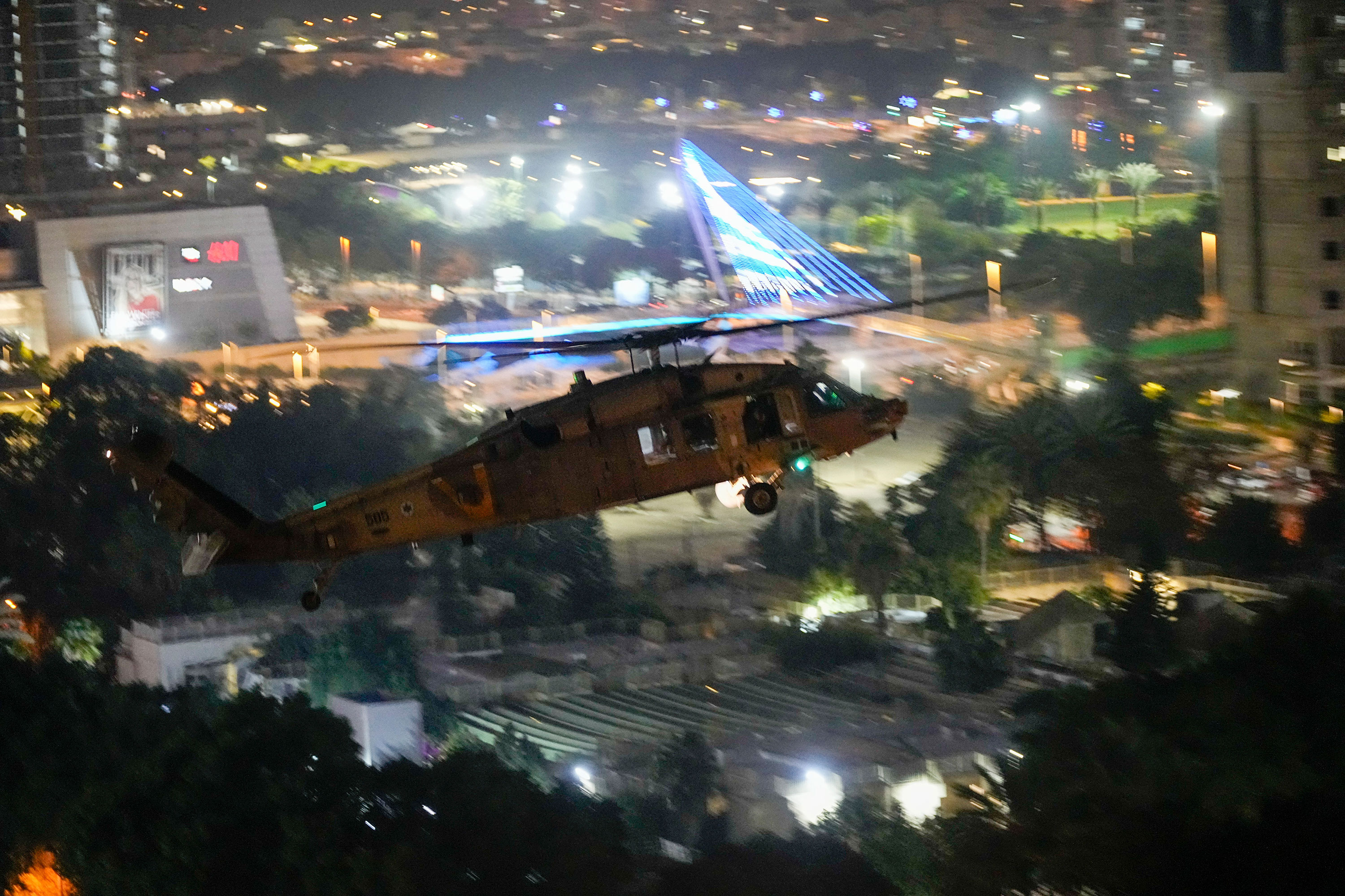 A helicopter carrying hostages released by Hamas lands at Schneider Children's Medical Center of Israel in Petah Tikva, Israel, on Friday. 