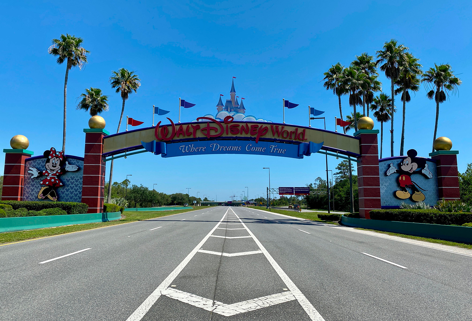 An empty road leads into a deserted Disney resort after it was closed due to the Covid-19 pandemic in Kissimmee, Florida on May 5.
