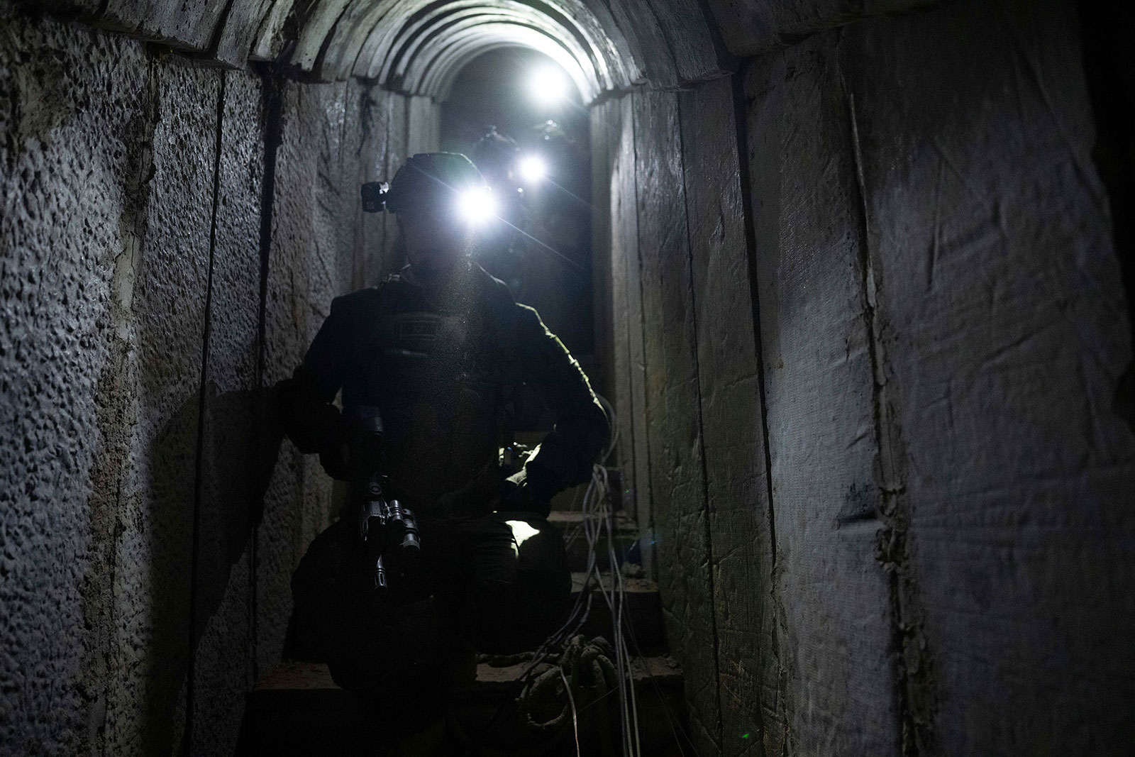 Israeli soldiers show journalists an underground tunnel where the Israeli military claims it found evidence hostages were held by Hamas in Khan Younis, Gaza, on January 10.