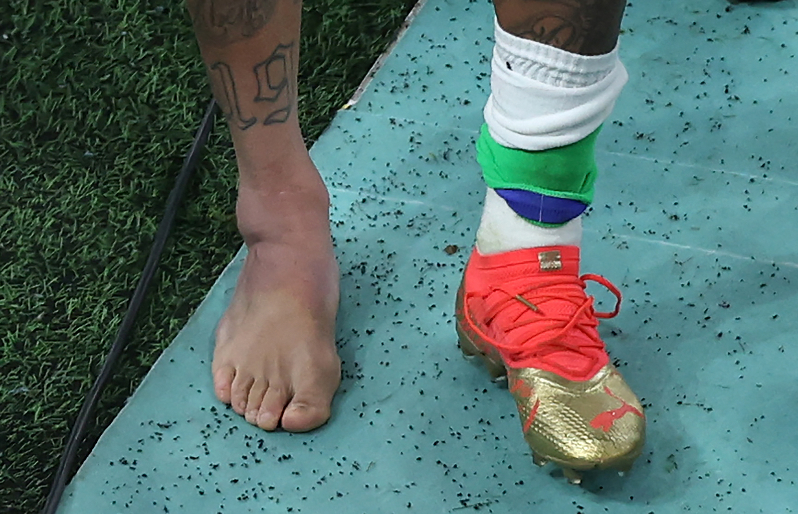 Neymar's swollen ankle as he leaves the field.