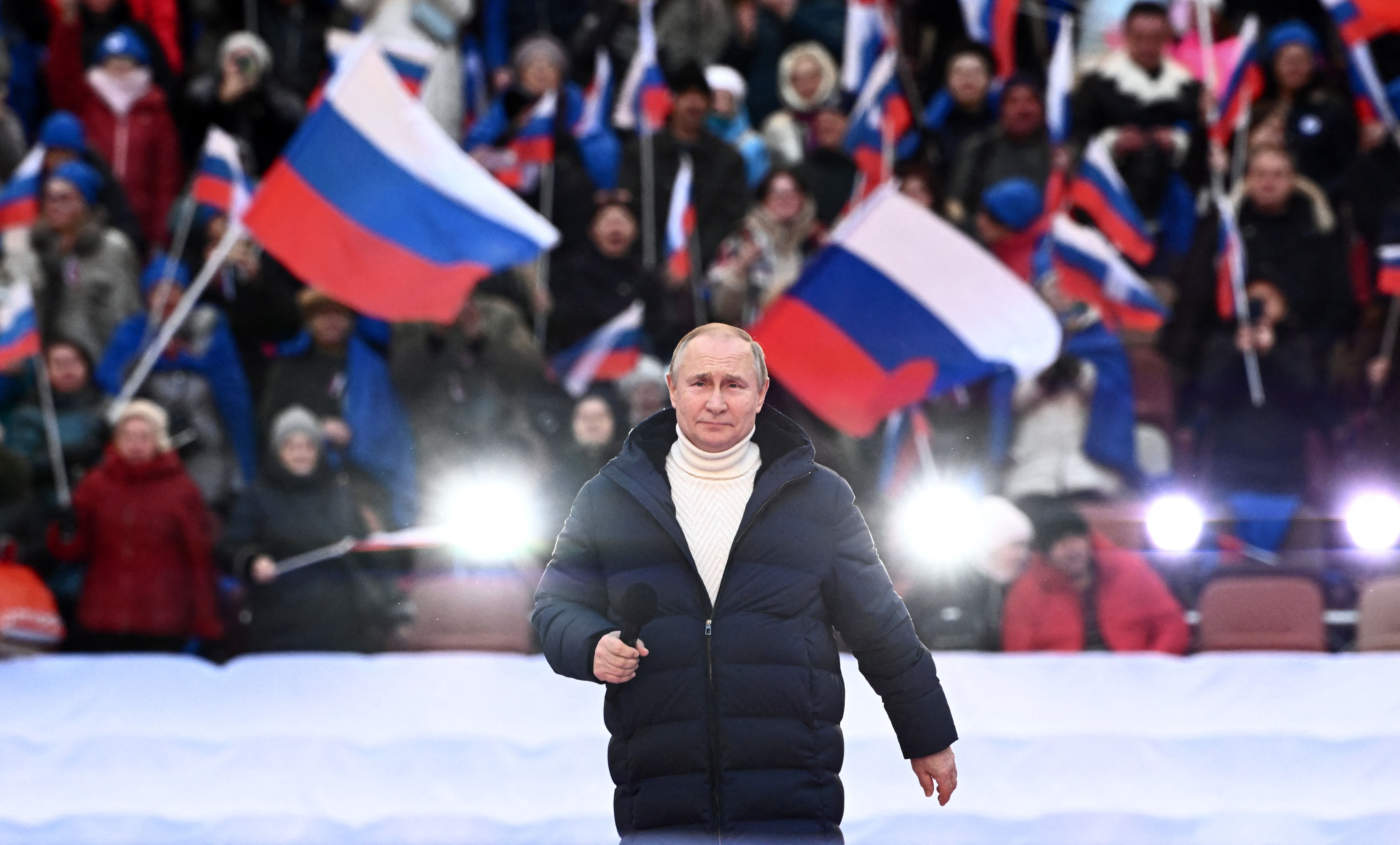 Russian President Vladimir Putin gives a speech at a concert marking the eighth anniversary of Russia's annexation of Crimea on March 18 in Moscow.