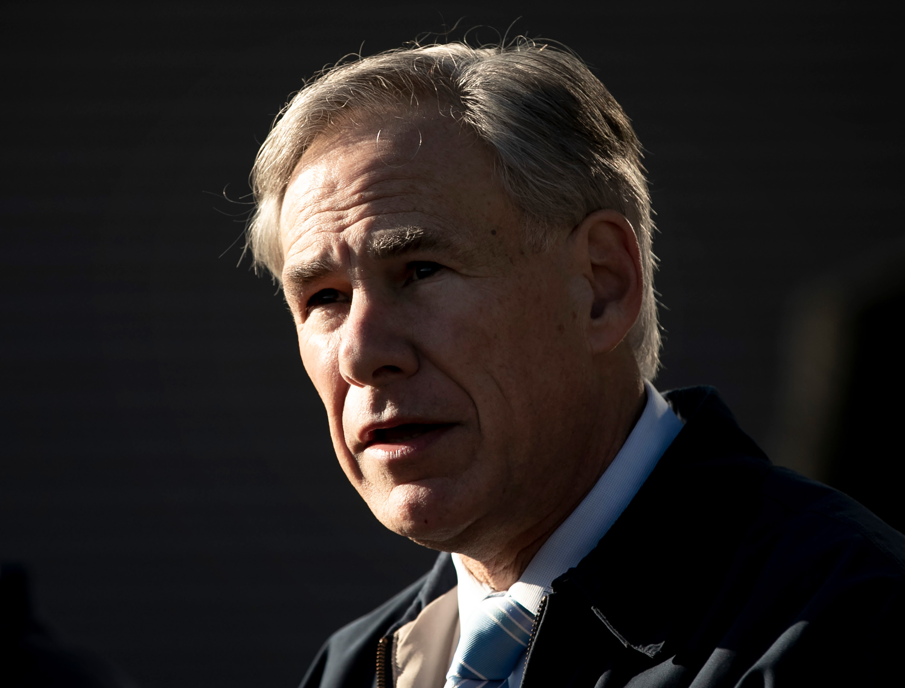 Gov. Greg Abbott speaks at a UPS Distribution Center in Austin, Texas, on December 17, 2020. 