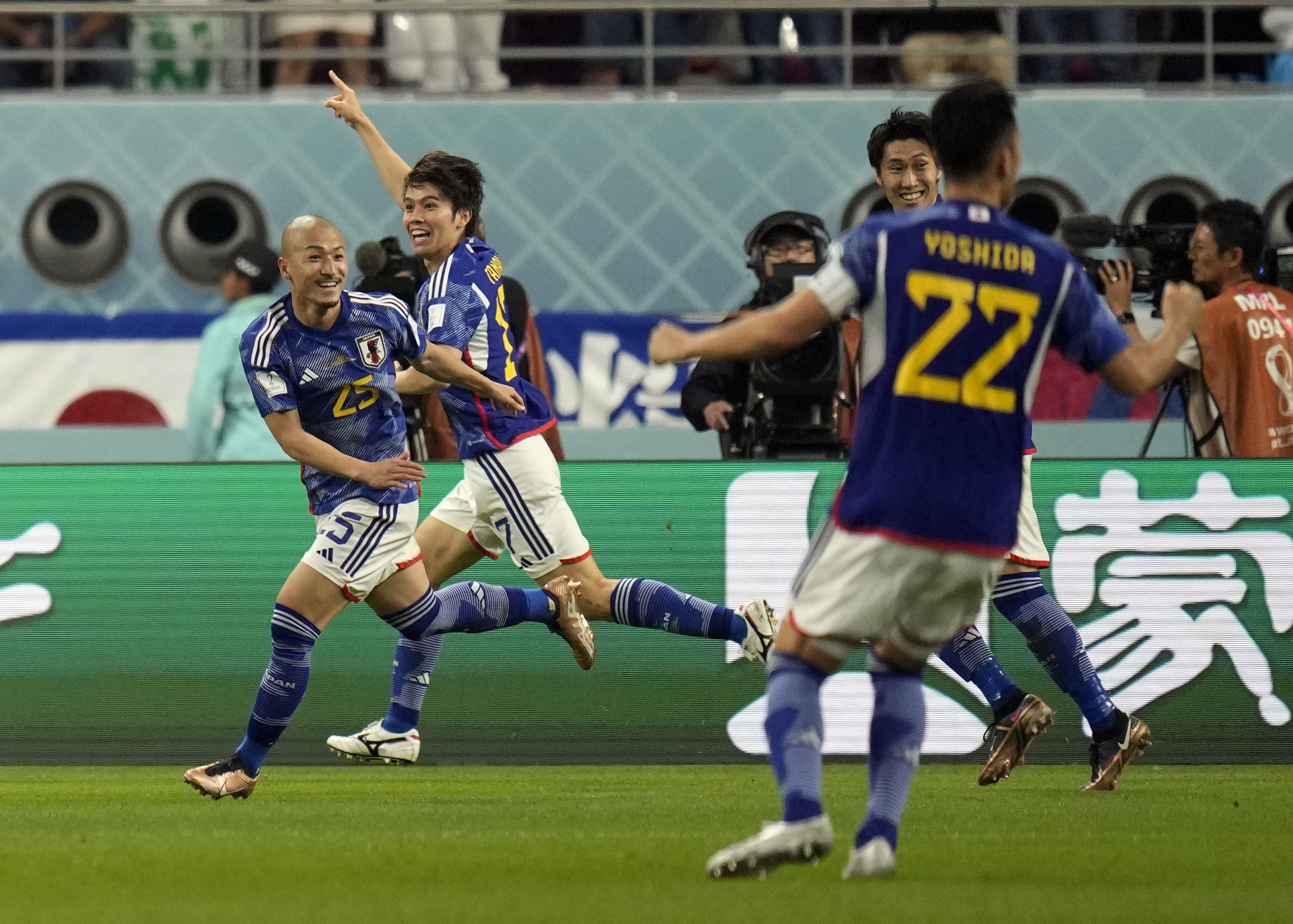 Japan's Ao Tanaka celebrates after scoring his team's second goal against Spain.