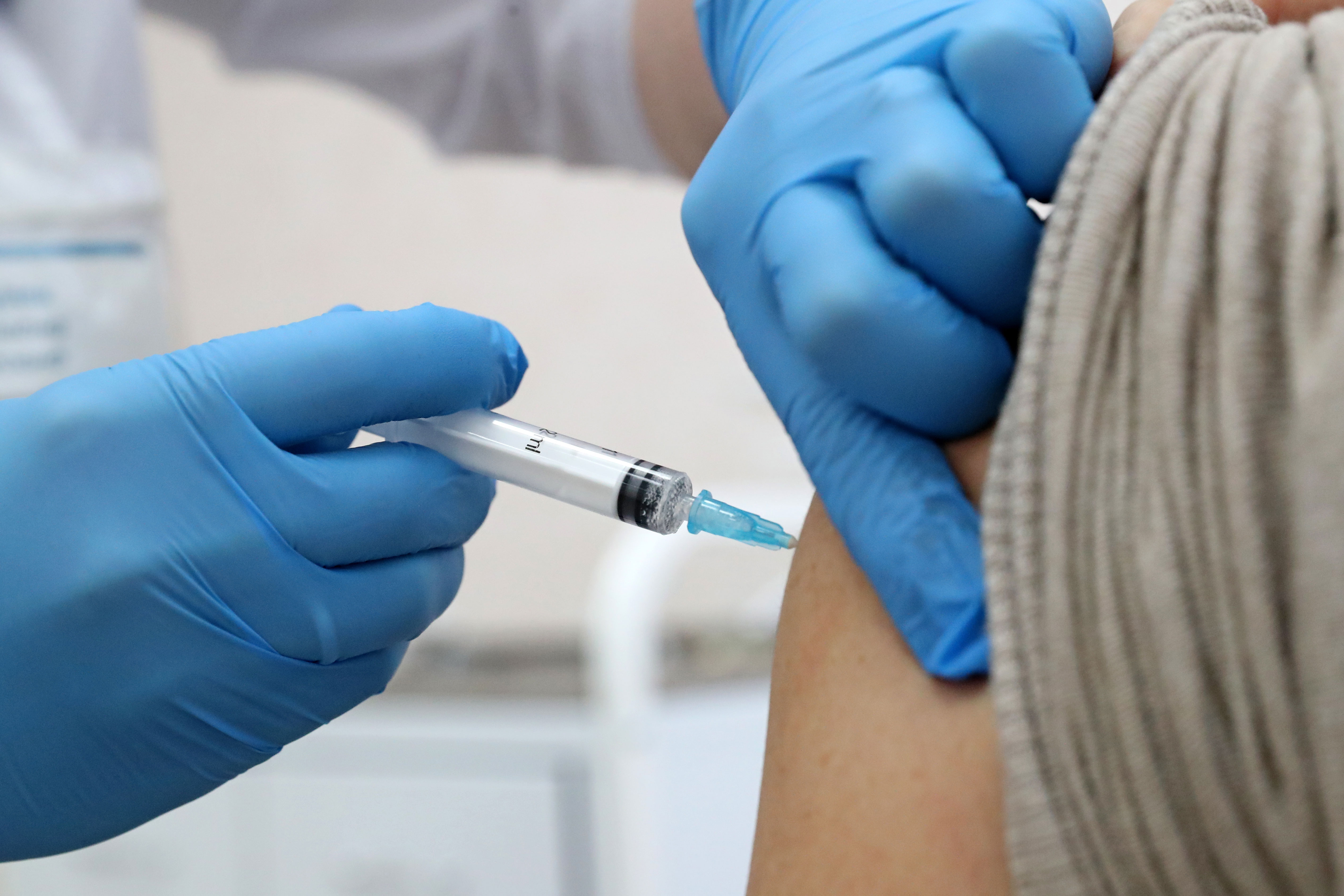 A person receives the Gam-COVID-Vac Covid-19 vaccine, also known as Sputnik V, in Moscow on January 2.