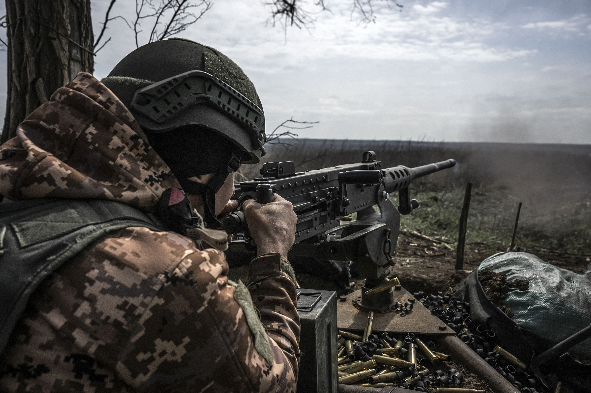 Ukrainian soldiers fire at targets on the front line in Donetsk, Ukraine, on April 18.