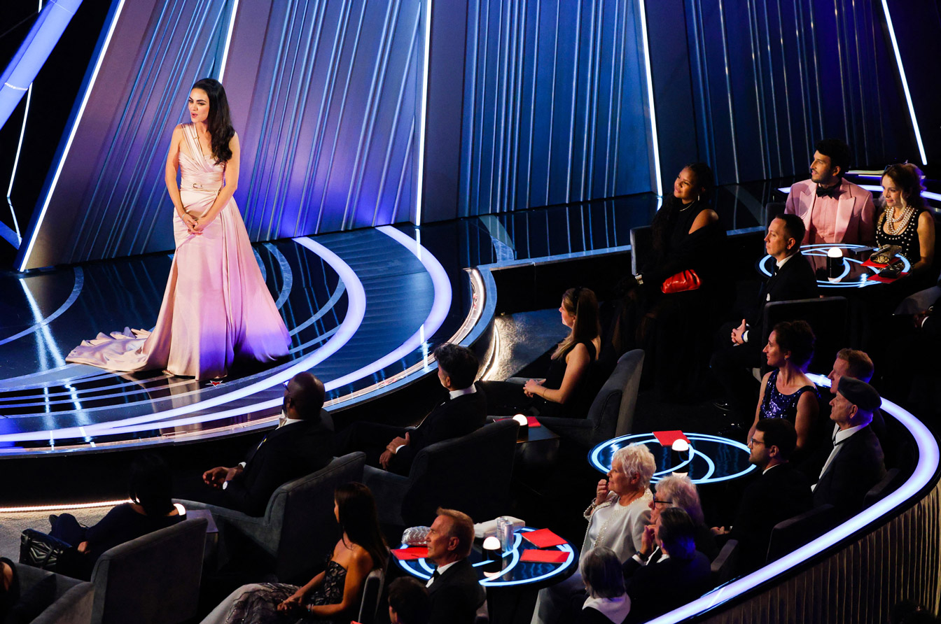 Mila Kunis speaks to the audience at the 94th Academy Awards on Sunday.