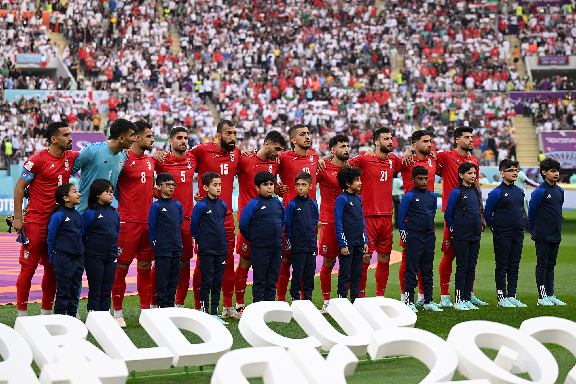 Iranian players line up for the national anthem prior to the FIFA World Cup Qatar 2022 Group B match between England and IR Iran at Khalifa International Stadium on November 21, in Doha, Qatar.