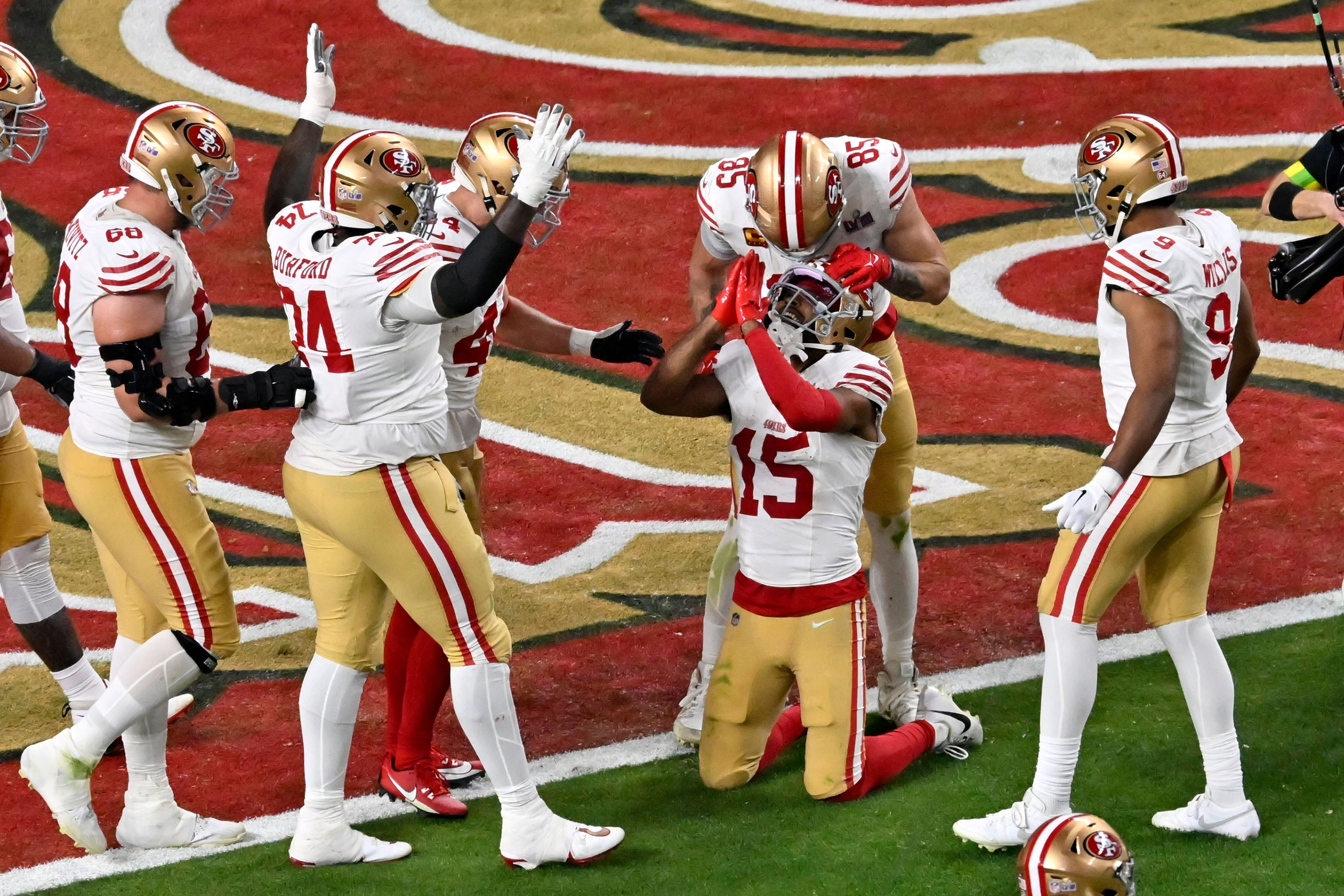 San Francisco 49ers wide receiver Jauan Jennings celebrates after scoring a touchdown.