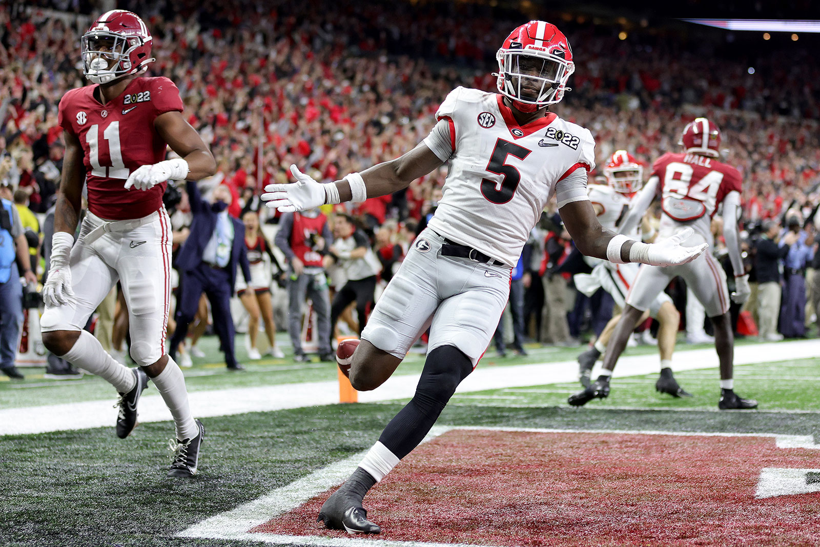 Kelee Ringo celebrates scoring on an interception late in the fourth quarter. 