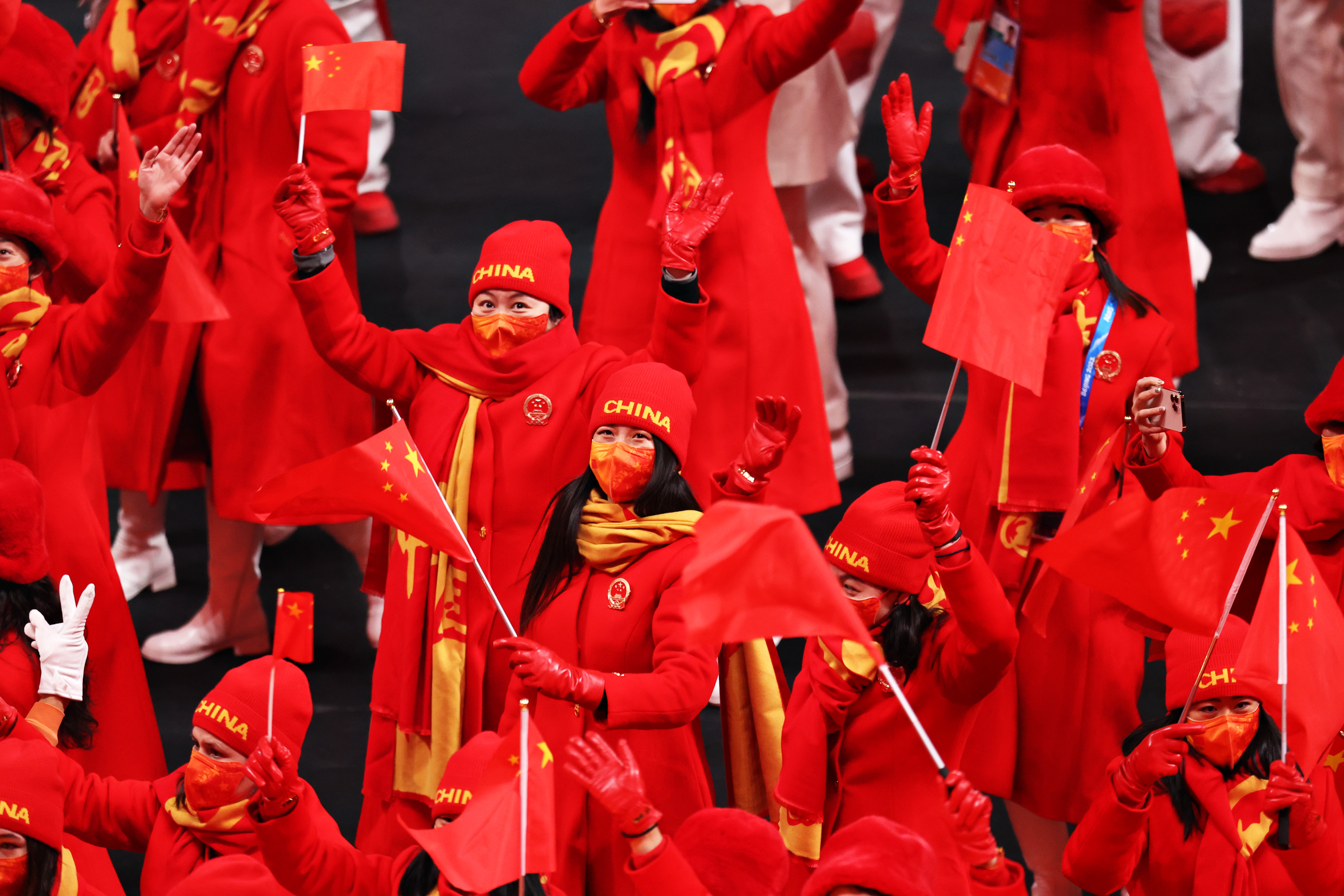 Members of Team China wave flags during the Opening Ceremony of the Beijing 2022 Winter Olympics at the Beijing National Stadium on February 04 in Beijing, China.