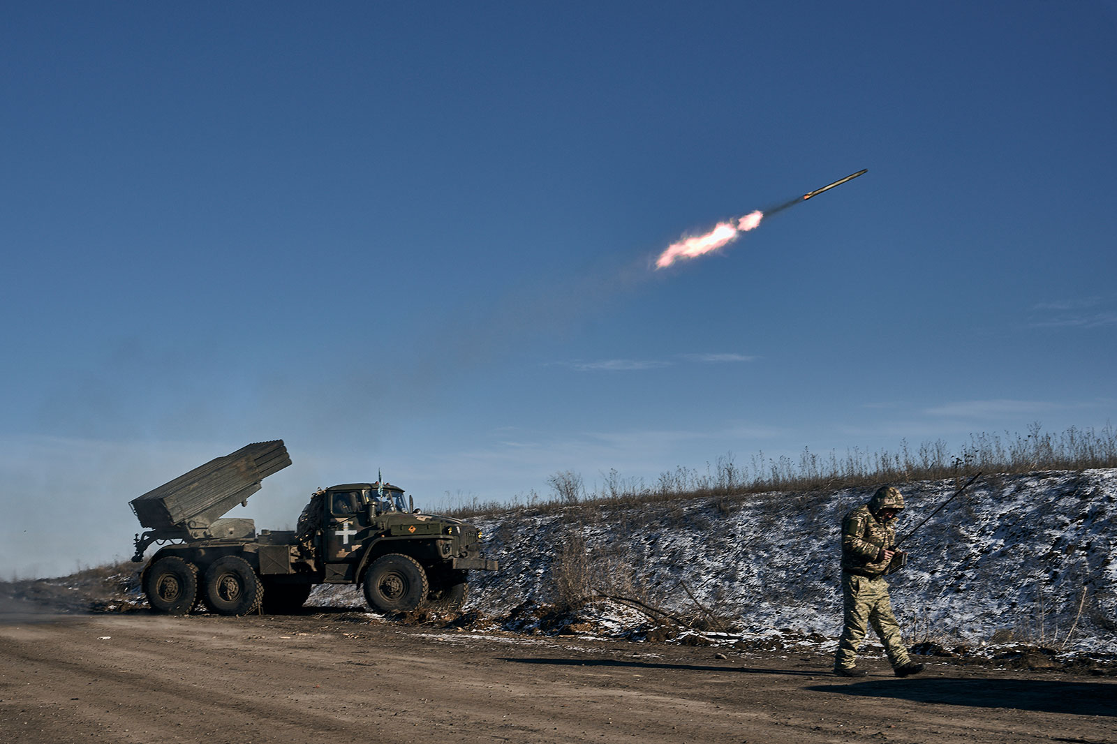 Ukrainian troops fire rockets at Russian positions near Soledar on Wednesday, January 11.
