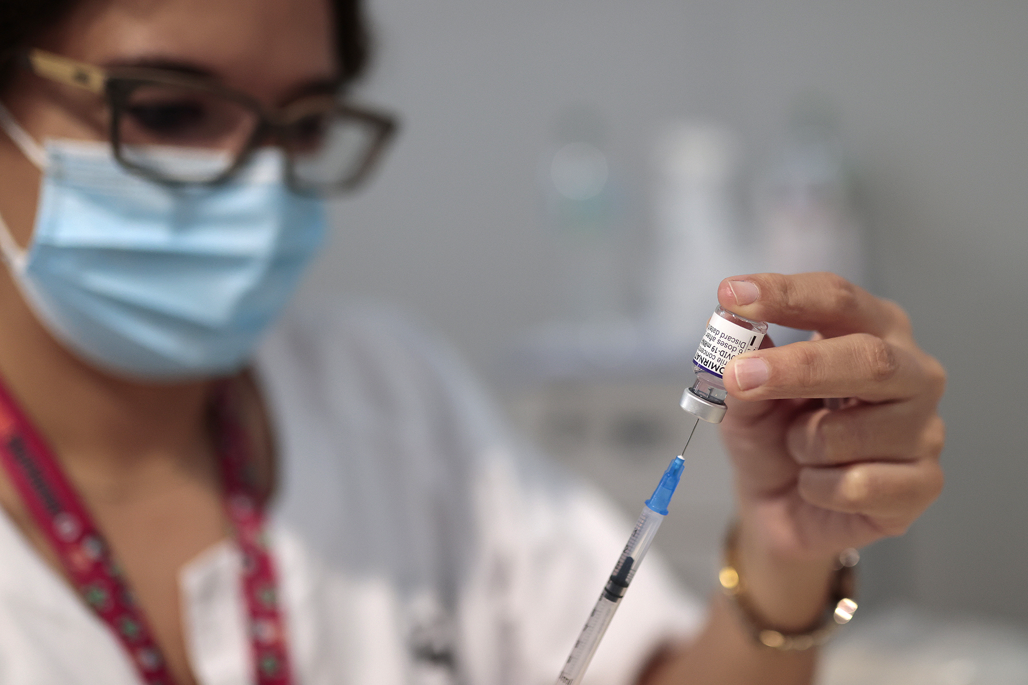 A health worker prepares a Covid-19 vaccine at Isabel Zendal Hospital in Madrid, Spain, on November 26. 