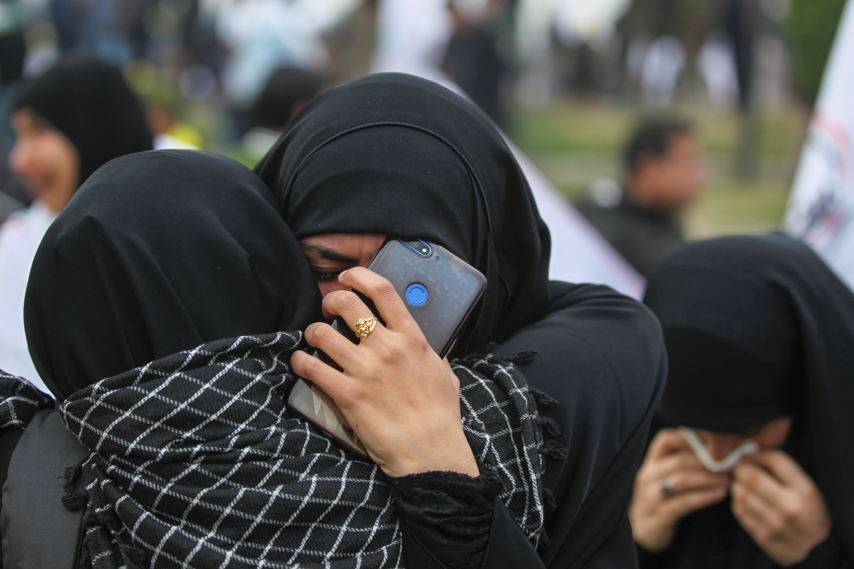 Mourners attend the funeral procession in Baghdad.