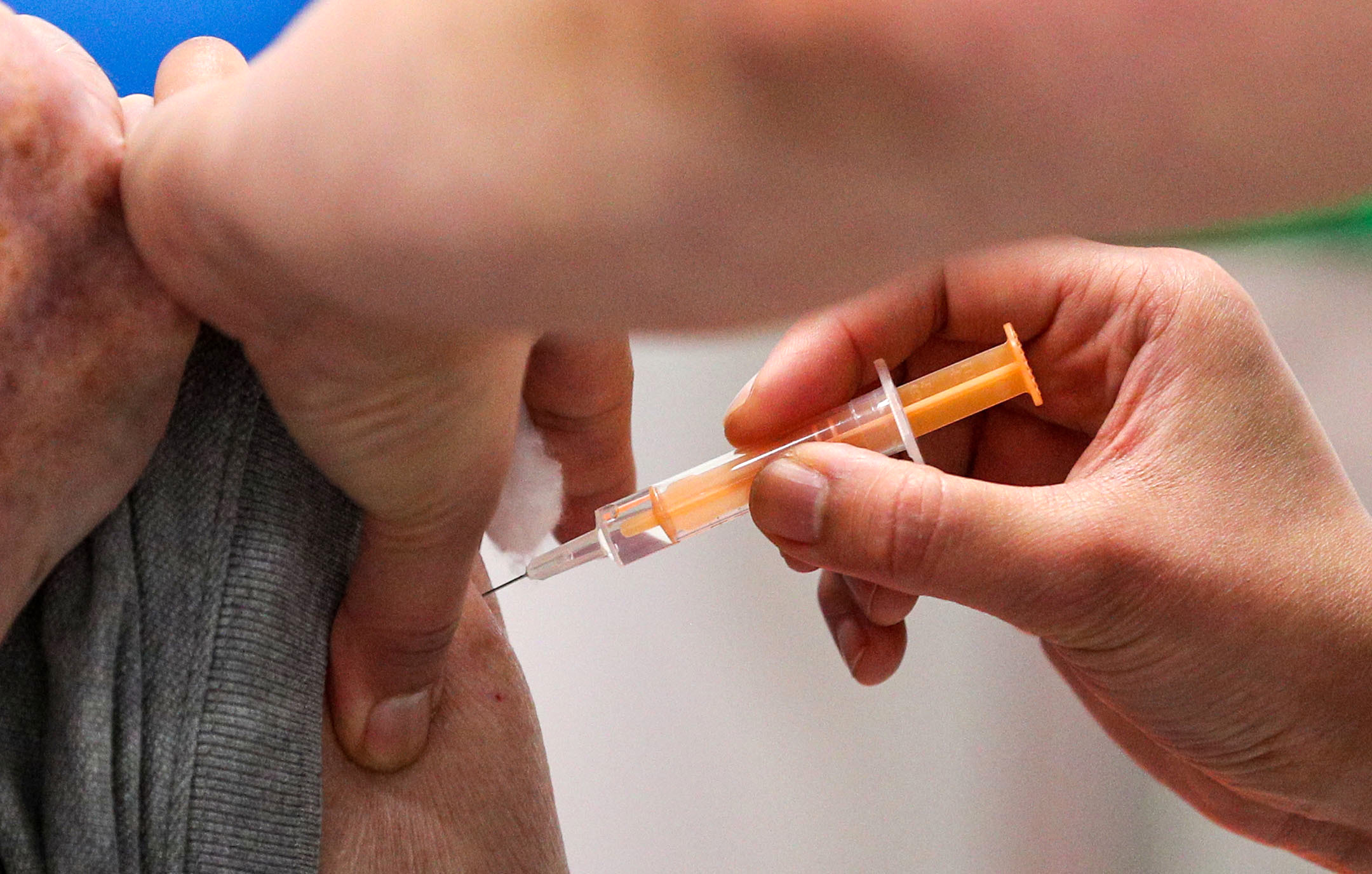A nurse administers a Covid-19 vaccine at Blackburn Cathedral on Monday, January 18, in Blackburn, England. 