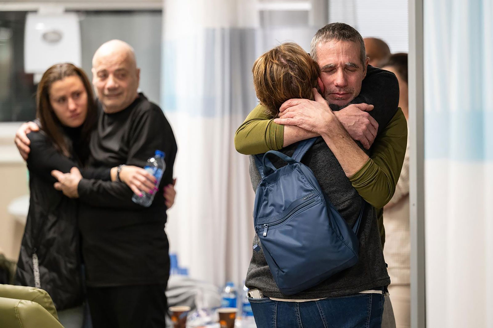 Fernando Simon Marman and Louis Har, two Israeli hostages who, according to the Israeli military, were freed in a special forces operation in Rafah, Gaza, reunite with loved ones at Sheba Medical Center, in Ramat Gan, Israel, on Tuesday, February 12.