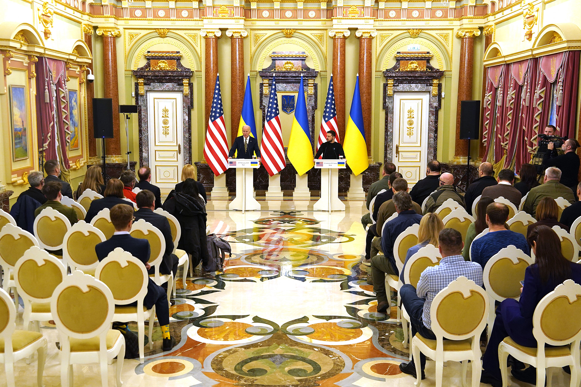 President Joe Biden and Ukrainian President Volodymyr Zelensky attend a press conference in Kyiv on February 20.