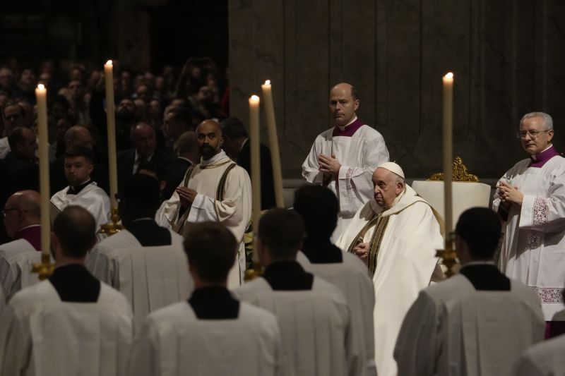 Pope Francis presides over Christmas Eve Mass in St. Peter's Basilica in the Vatican on December 24.