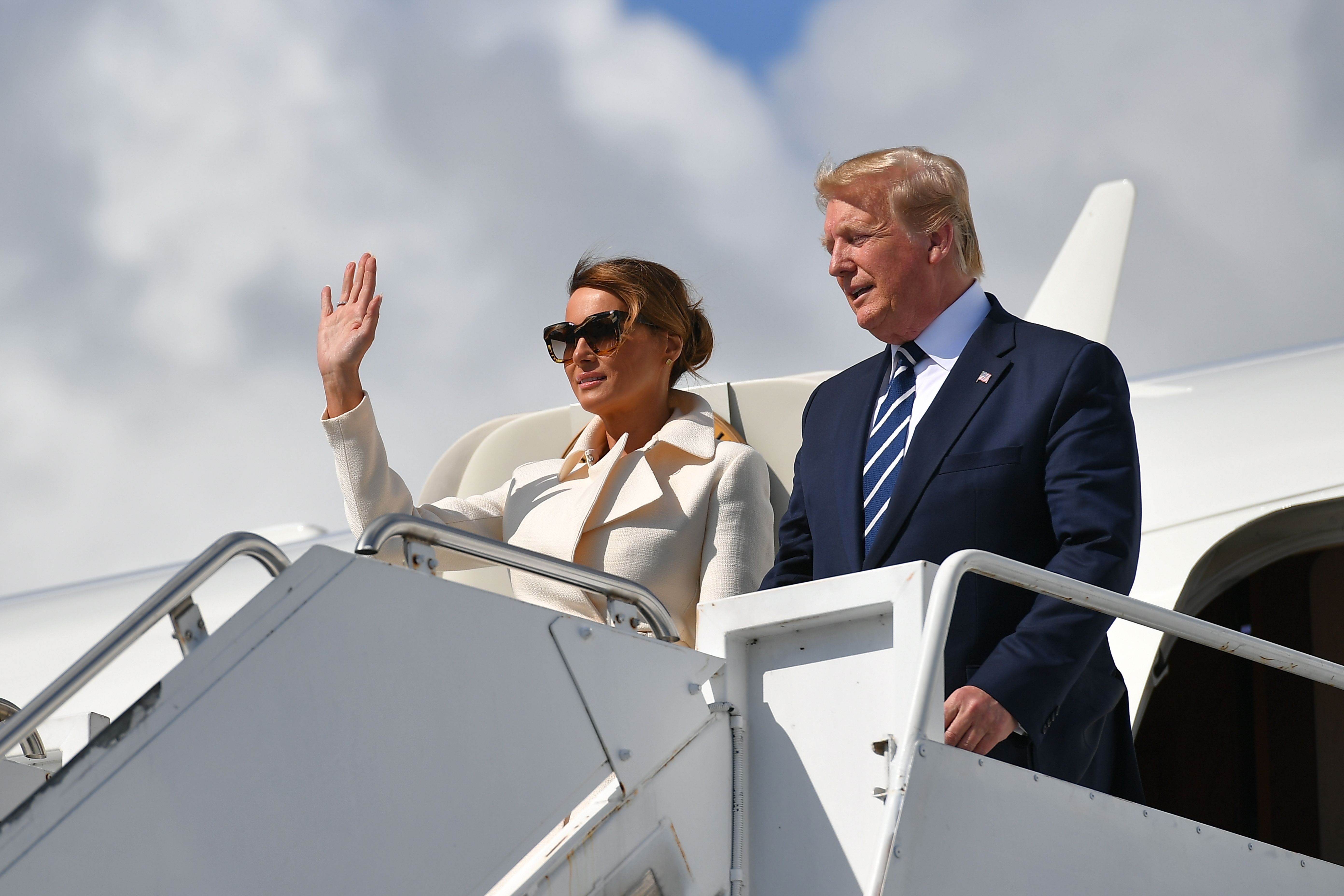 President Trump (R) and first lady Melania Trump (L) disembark Air Force One upon arrival at Shannon Airport in Shannon, Ireland on June 5, 2019.