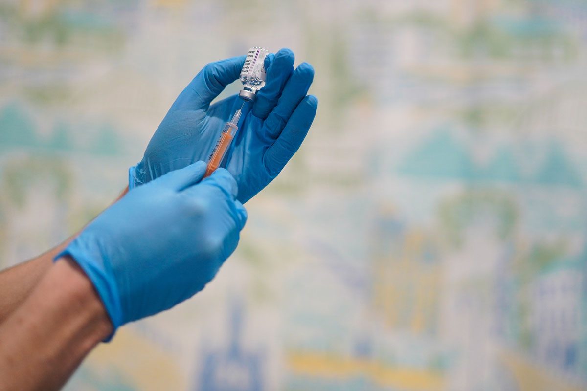 A member of medical staff at the NHS Nightingale North East hospital draws up the Oxford-AstraZeneca Covid-19 vaccine on January 26 in Sunderland, England. 