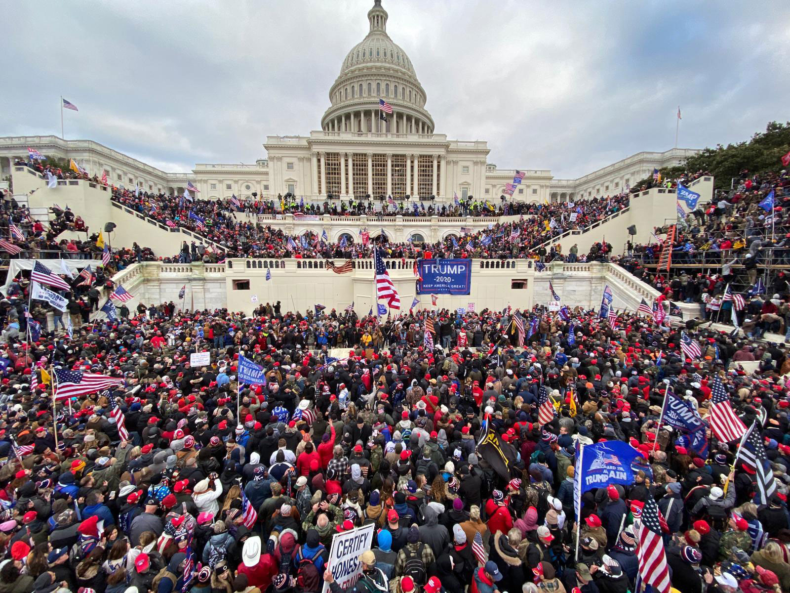 Rioters gather outside the Capitol building in Washington on January 6.