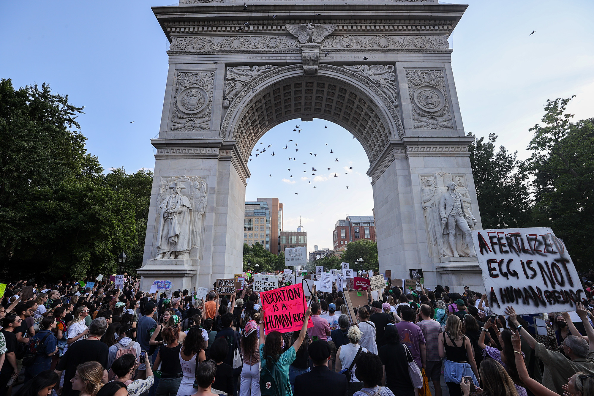 Thousands are gathered at the Washington Square Park in New York City to protest against the Supreme Court's decision on June 24.