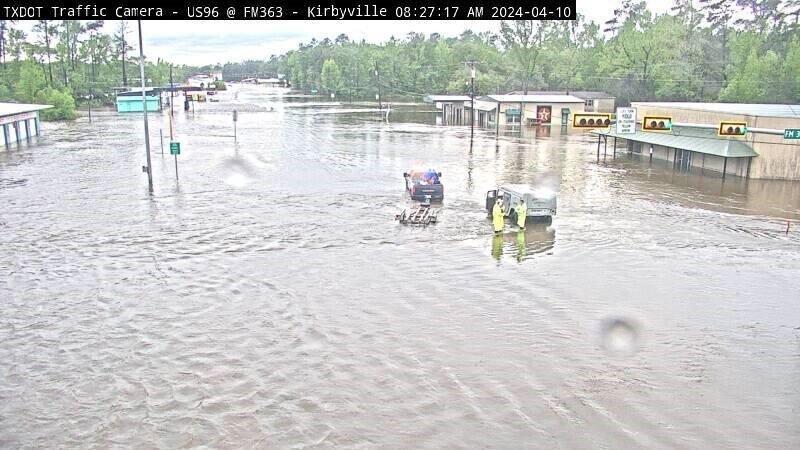 A screengrab from a Texas Department of Transportation camera in Kirbyville shows a flooded roadway Wednesday morning after several water rescues were made in the area.
