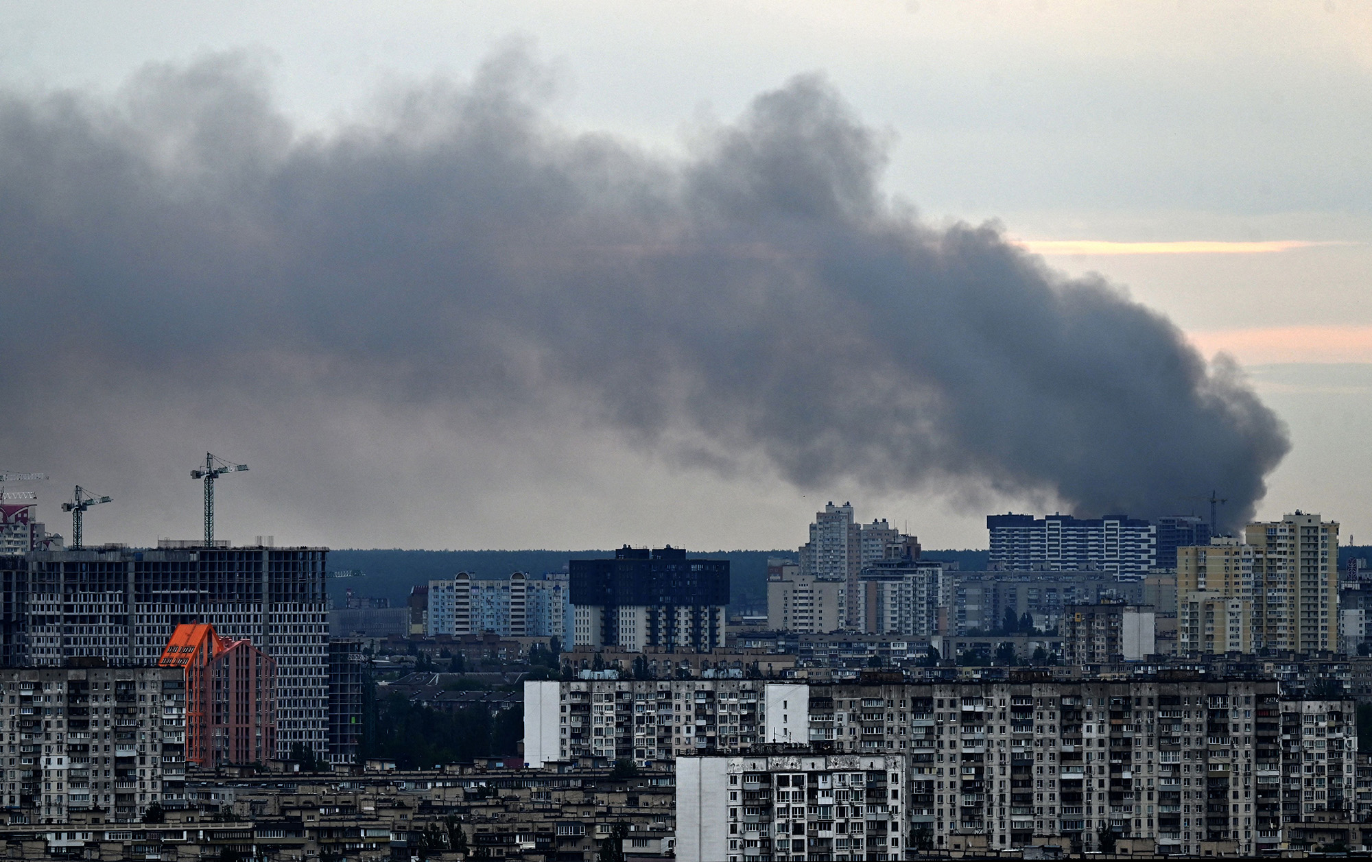 Smoke rises after several missiles hit Kyiv, Ukraine on June 5. 