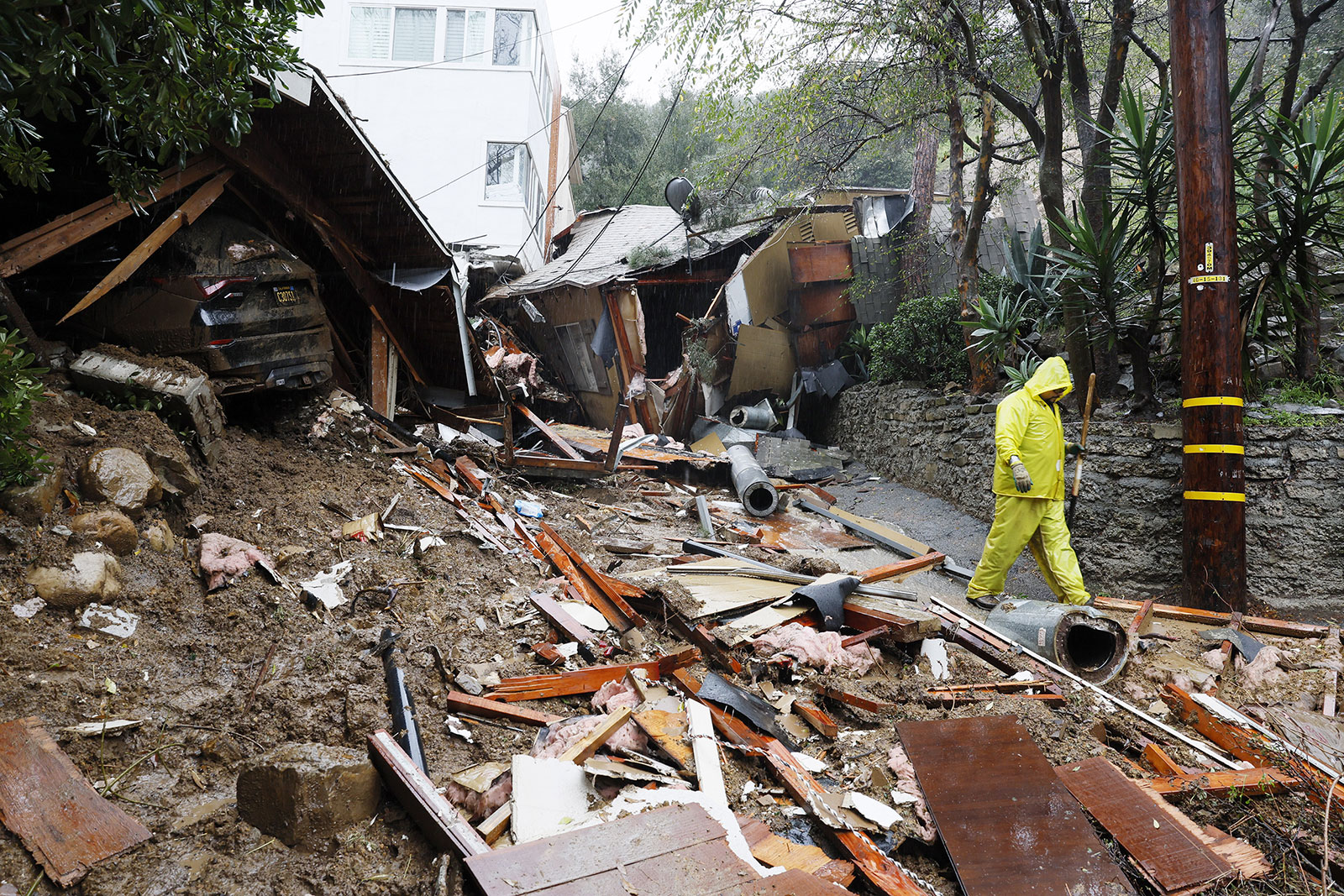 Mud and debris block portions of a street in the Beverly Crest area of Los Angeles on Monday, February 5. 