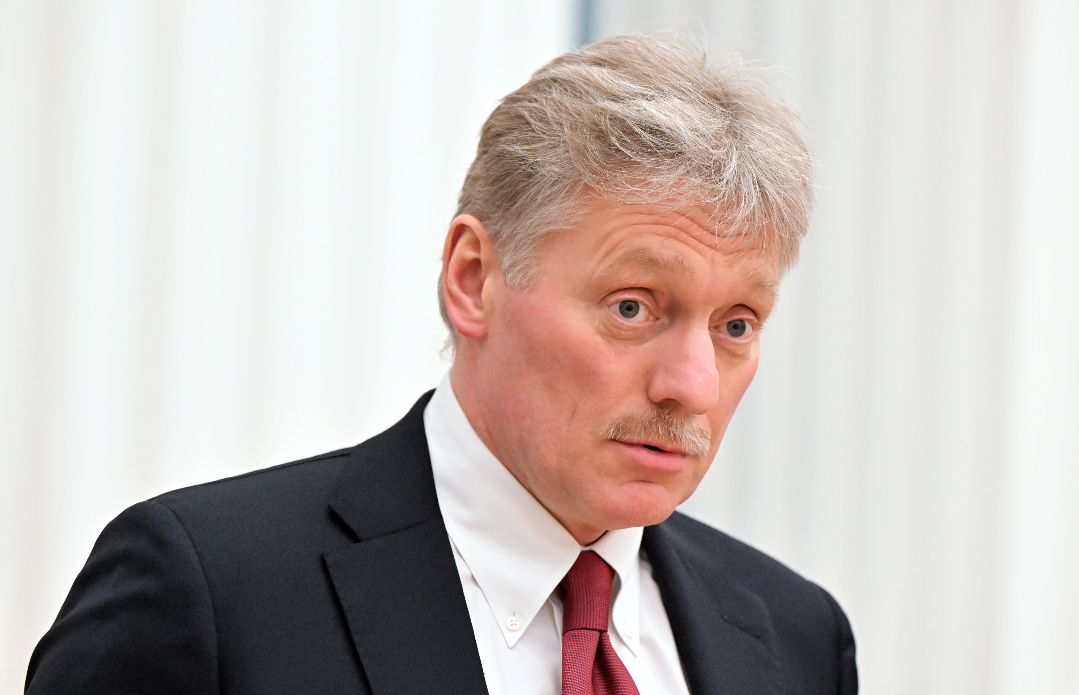 Kremlin spokesman Dmitry Peskov is seen at a press conference in Moscow, on Feb. 18. 