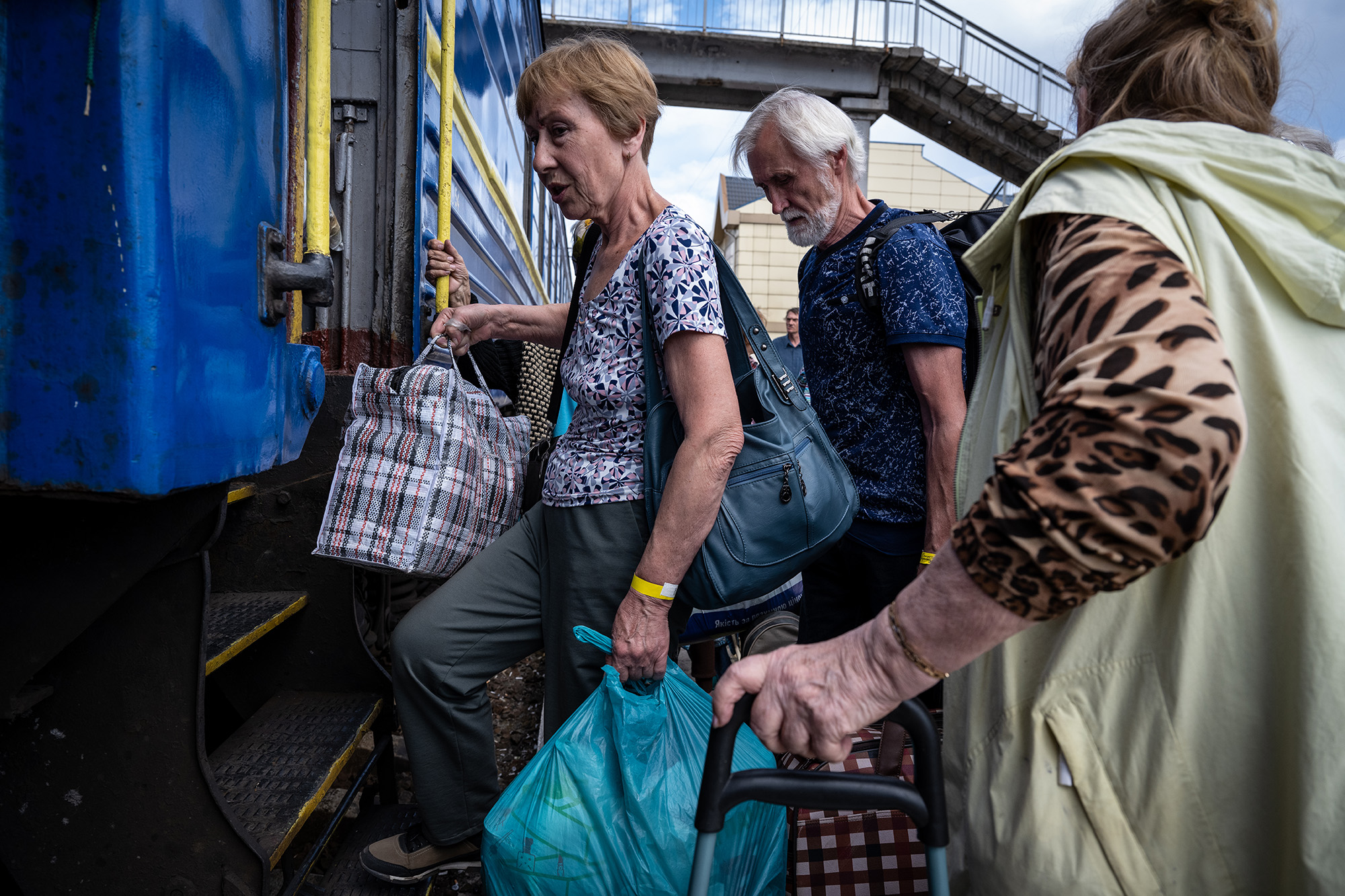 Scores of Ukrainian evacuees from the embattled city of Lysychansk board an evacuation train to safer cities to the west, from the train station in Pokrovsk, Ukraine, on June 24.