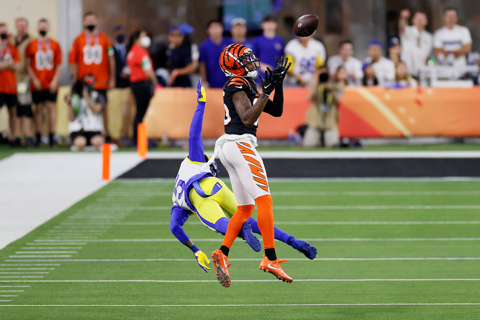 Tee Higgins of the Cincinnati Bengals catches the ball over Jalen Ramsey of the Los Angeles Rams for a touchdown in the third quarter.