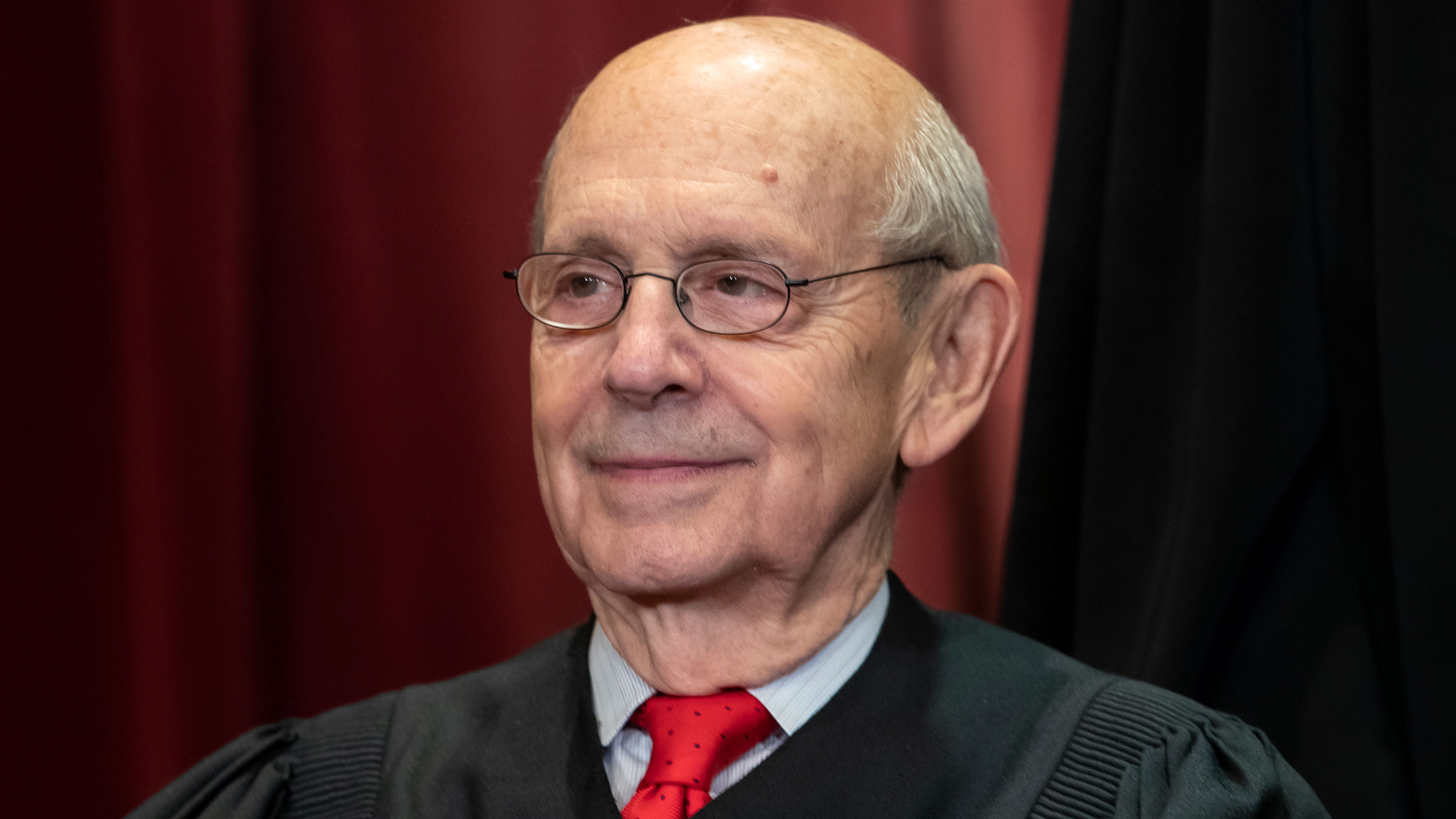 Stephen Breyer sits with his fellow Supreme Court justices for a group photo in 2018.