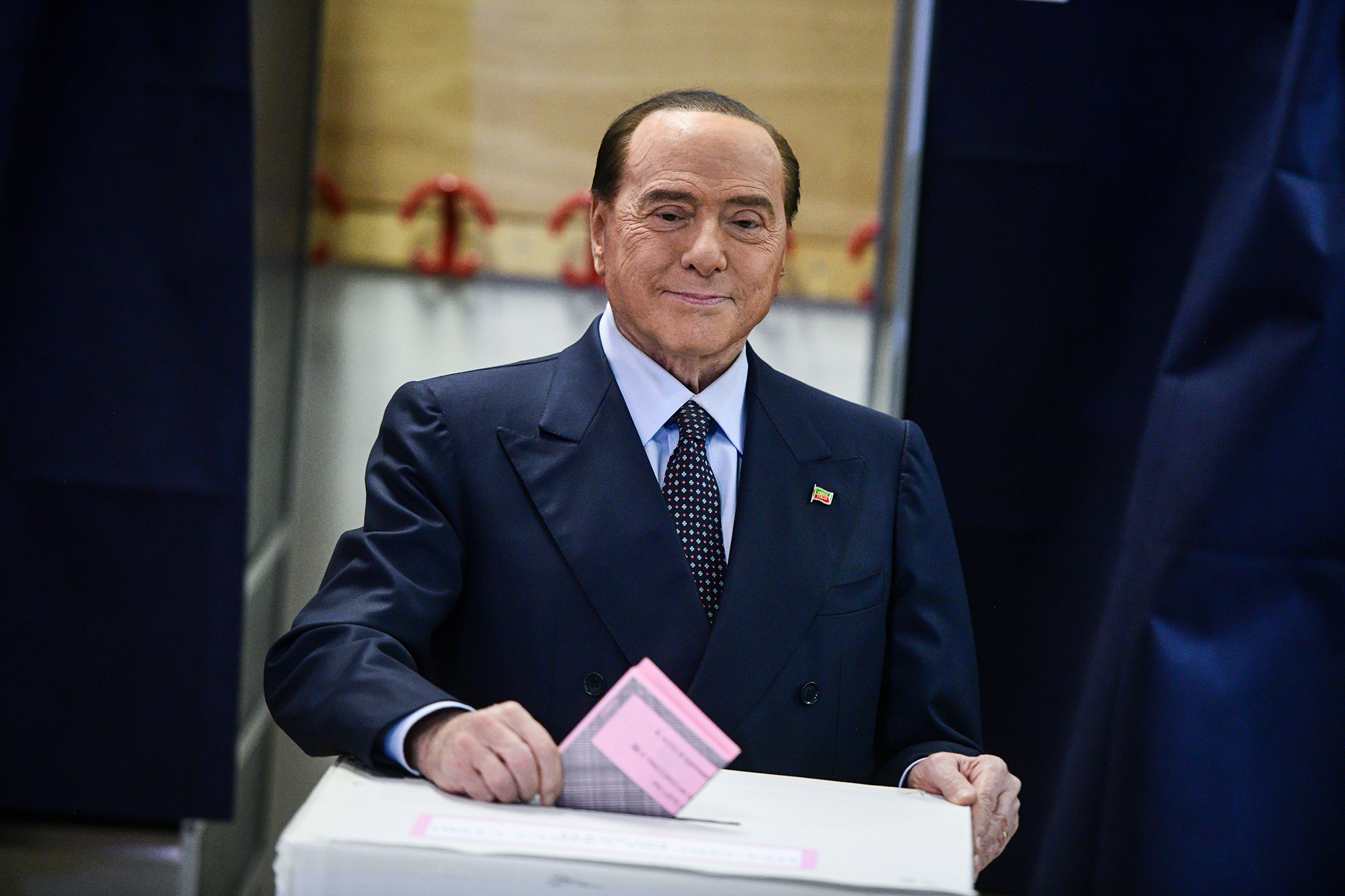 Silvio Berlusconi, leader of Forza Italia, casts his vote during the general elections in Milan, Italy, on September 25, 2022.