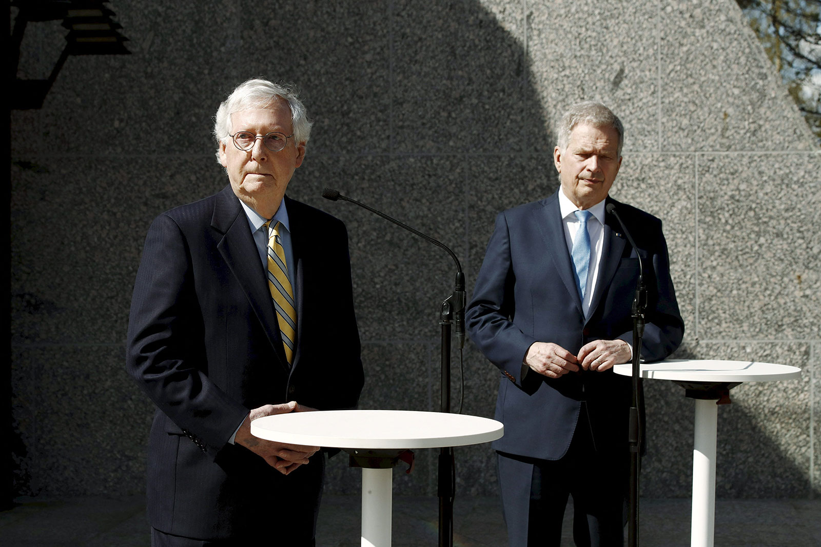 Senate Minority Leader Mitch McConnell and Finland's President Sauli Niinistö speak to the press after their meeting in Helsinki on Monday.