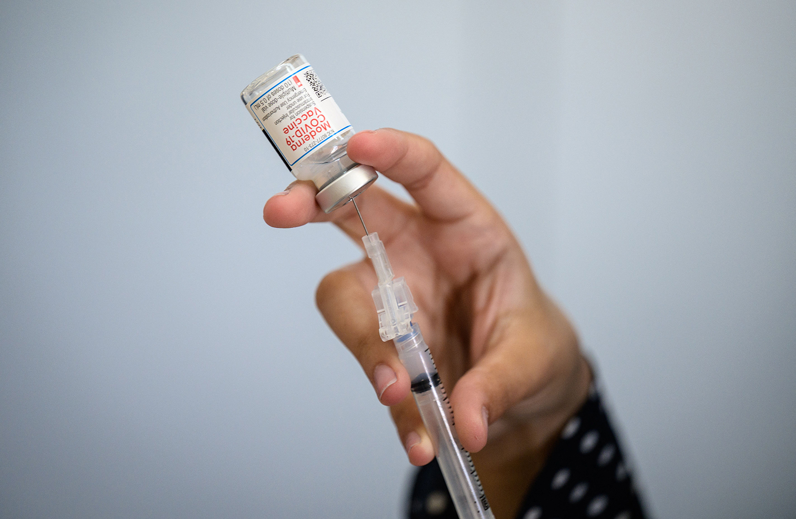 A medical staff member prepares a syringe with a vial of the Moderna Covid-19 vaccine at a pop up vaccine clinic in the Staten Island borough of New York City, on April 16.