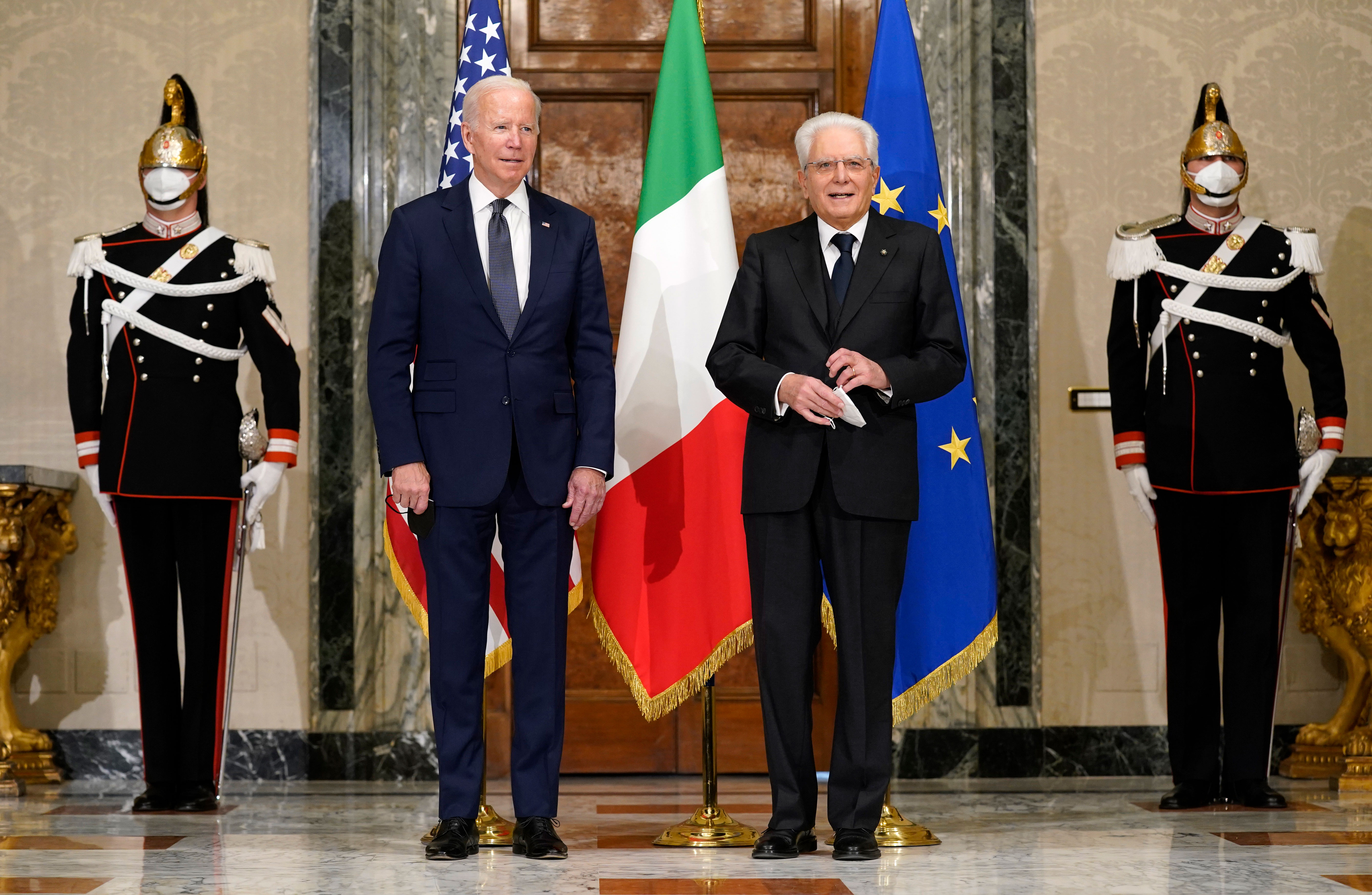 President Joe Biden takes a photo with Italy's President Sergio Mattarella prior to a meeting at the Quirinale Palace in Rome on October 29.