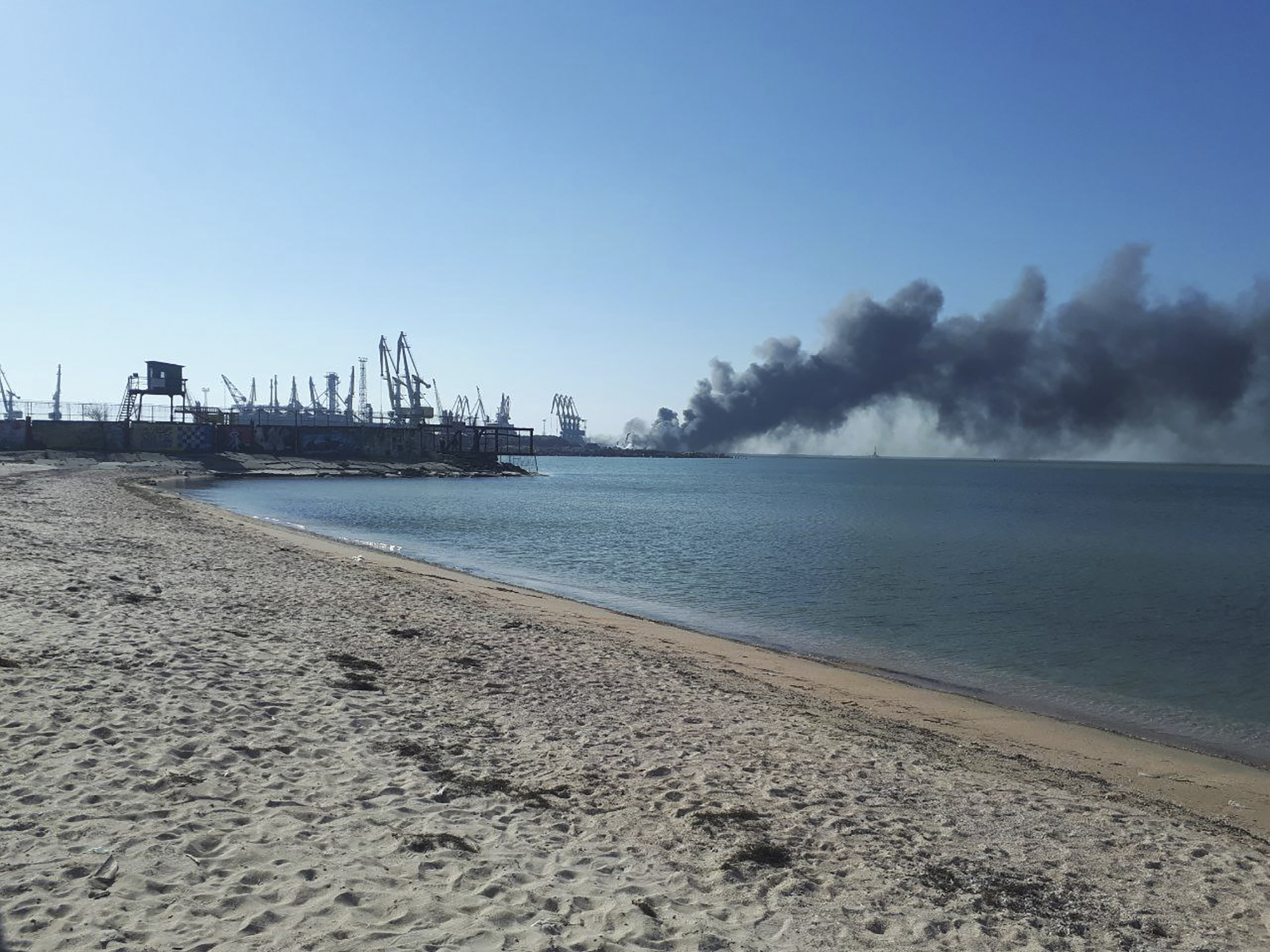 Smoke rises after shelling near a seaport in Berdyansk, Ukraine, on March 24. 