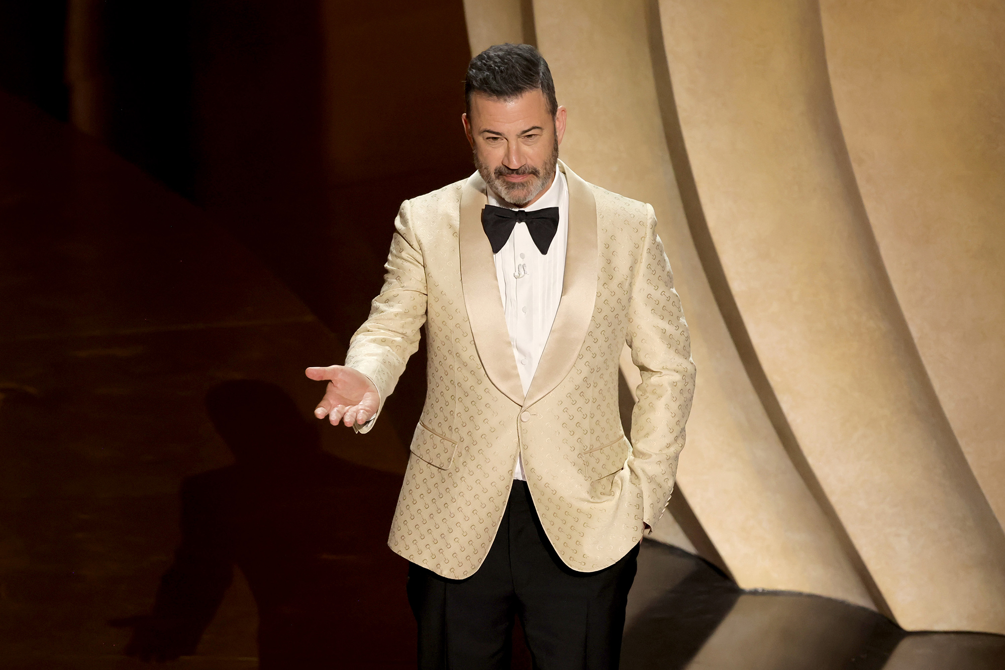 Host Jimmy Kimmel speaks onstage. 