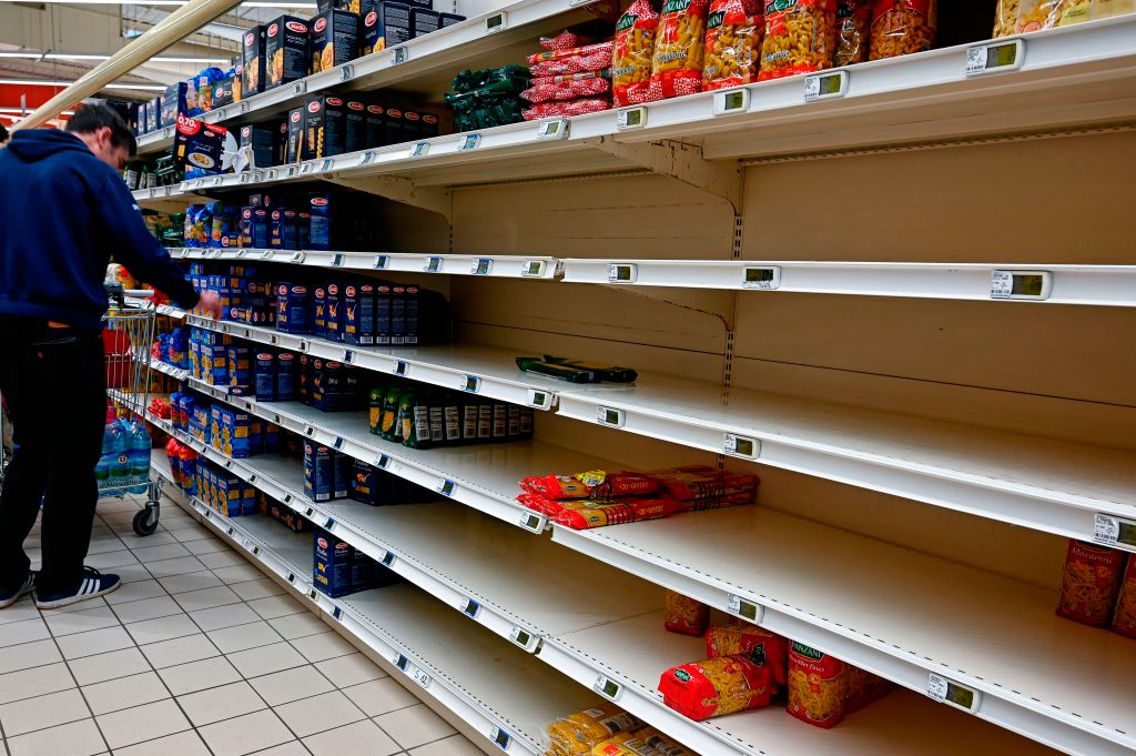 Empty stalls in a supermarket in Tinteniac, France, on Saturday, as the government announced new restrictions due to coronavirus.