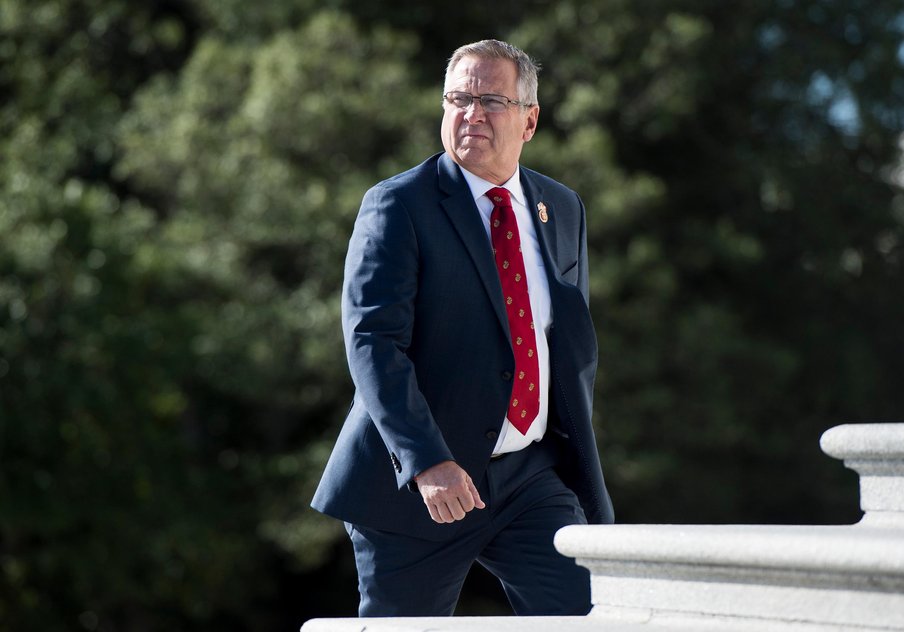Rep. Mike Bost walks up the House steps in October 2019.