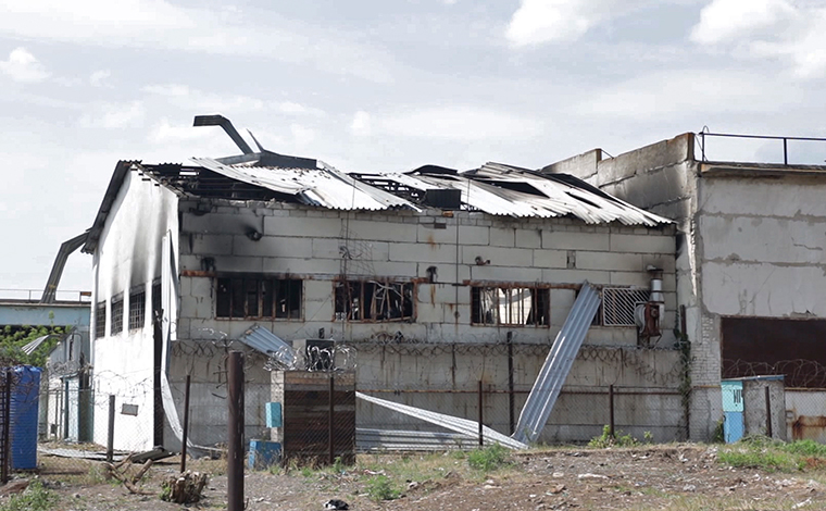 An image taken from video shows a destroyed barrack at a prison in Olenivka, in an area controlled by Russian-backed separatist forces, eastern Ukraine, on Friday, July 29