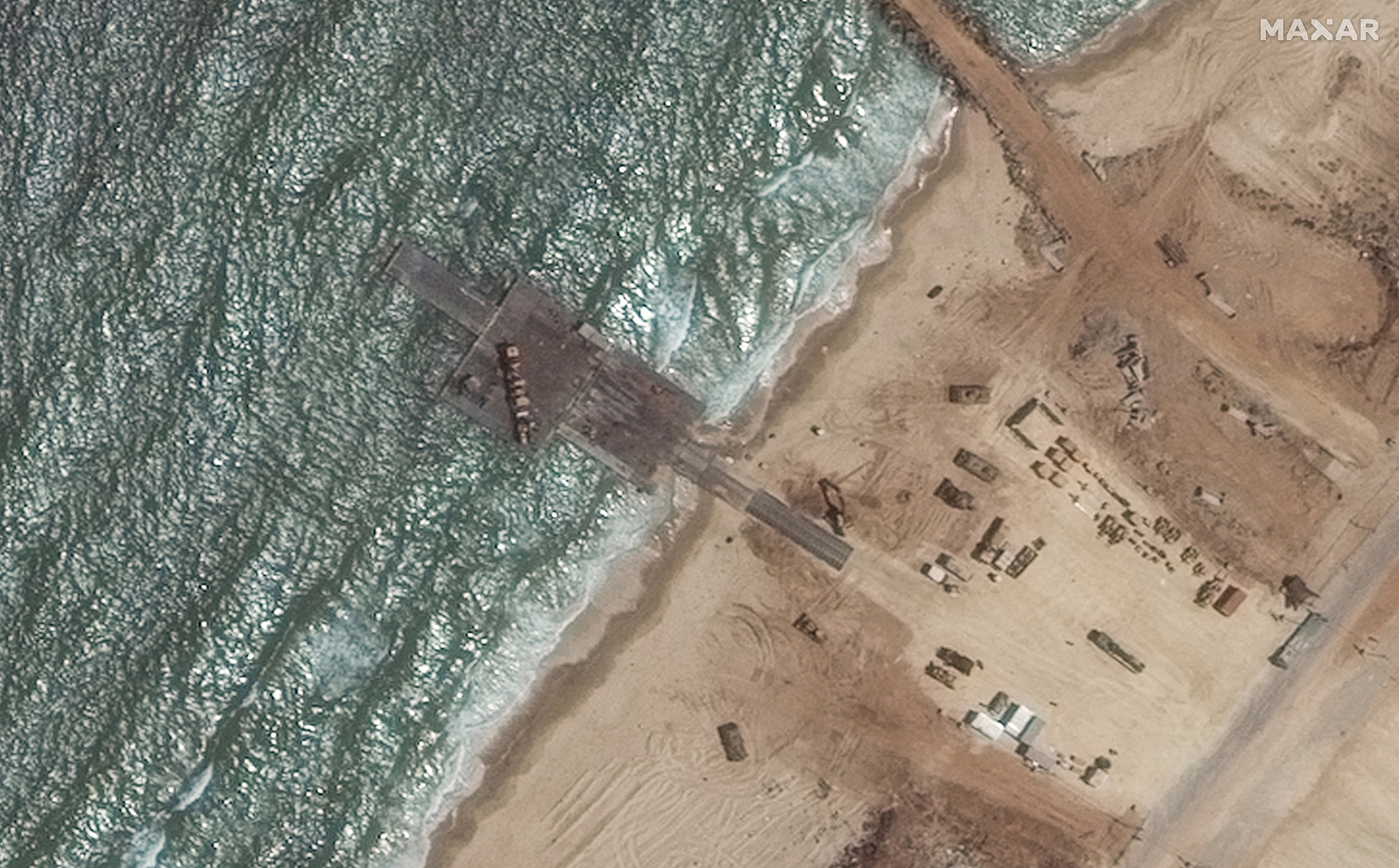 A satellite image shows a view of the remaining section of the trident pier on the Gaza shoreline on May 29, 2024. 
