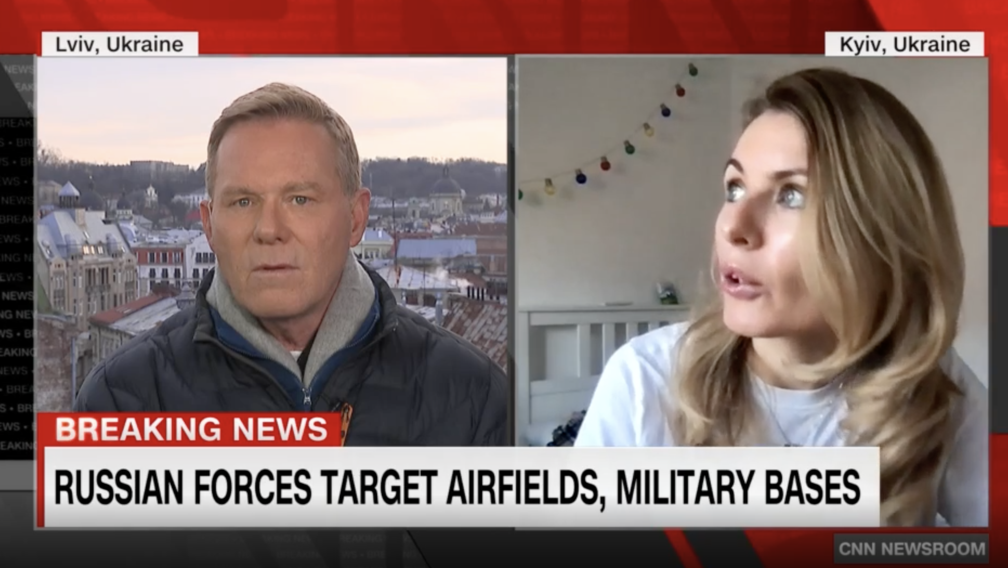 Ukrainian lawmaker Lesia Vasylenko speaks to CNN from Ukraine on February 25 as aircraft fly overhead.