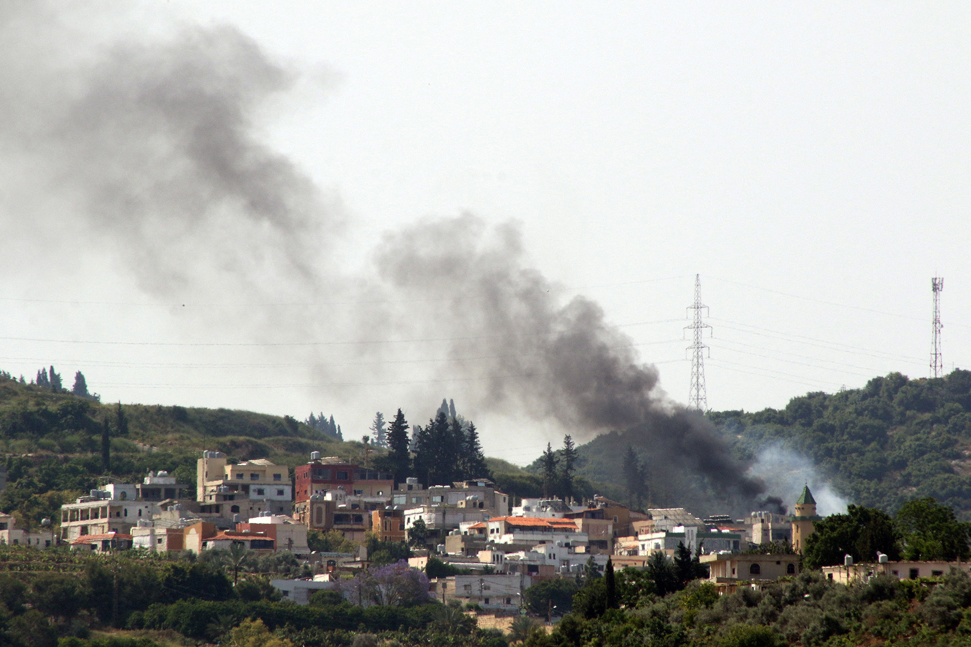 Smoke billows during Israeli bombardment over the Lebanese village of Al-Najjariyeh on May 17.