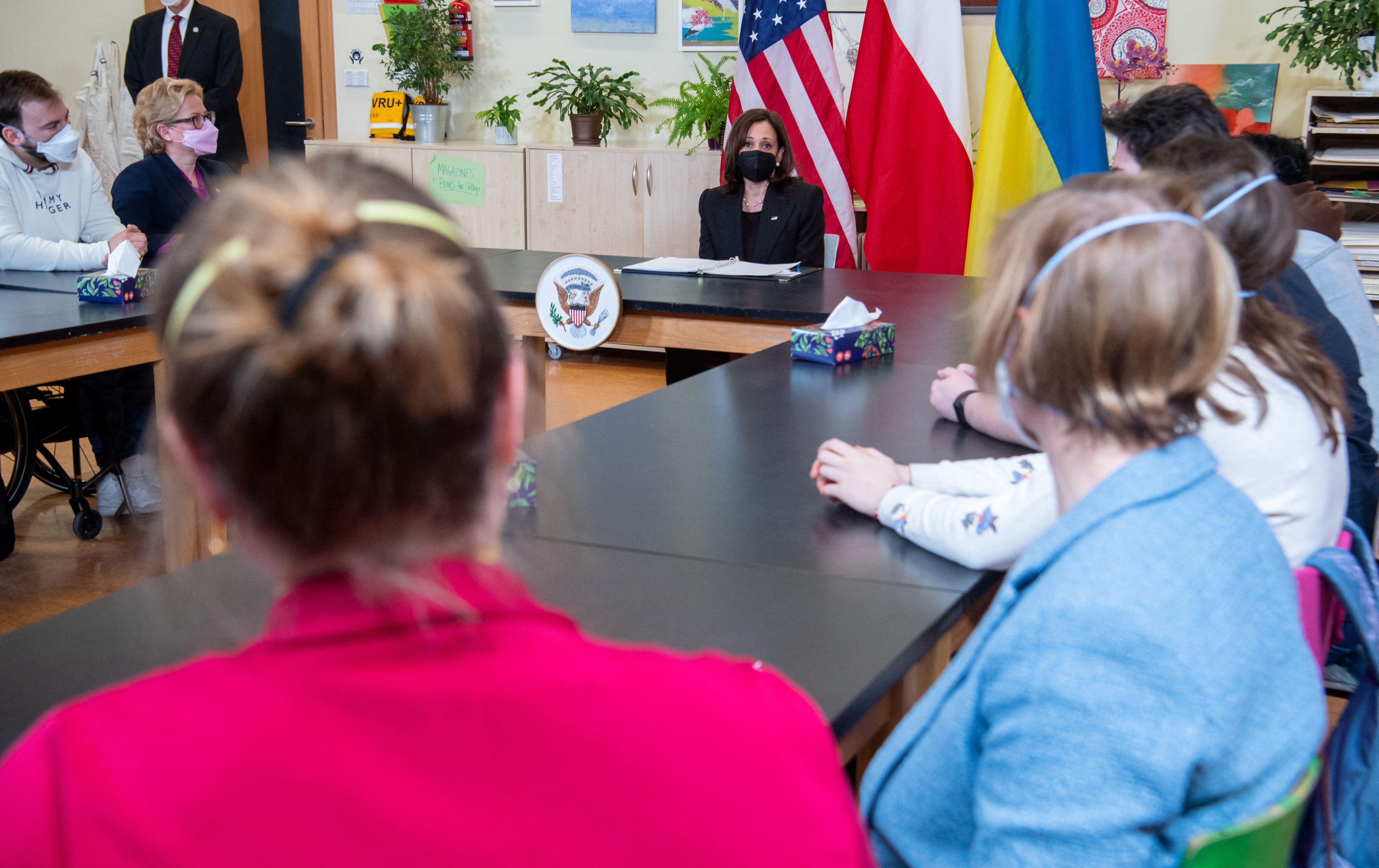US Vice President Kamala Harris (C) holds a roundtable discussion with people displaced from Ukraine at the American School of Warsaw in Warsaw, Poland on March 10.