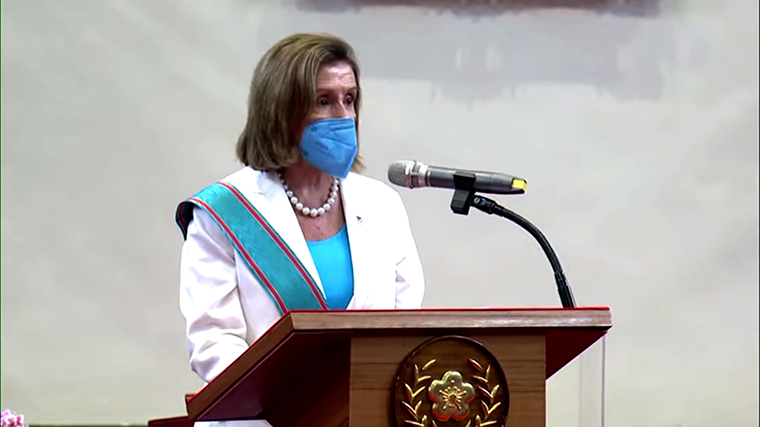 Pelosi speaks from the presidential office in Taipei.