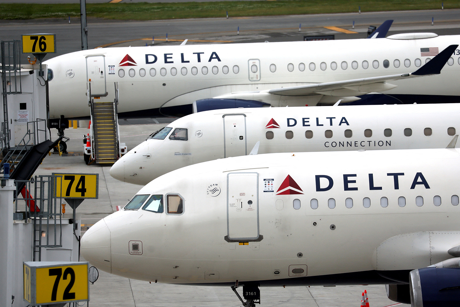 Delta Airlines passenger jets are pictured outside the newly completed Delta Airlines Terminal C at LaGuardia Airport in New York City, in June.