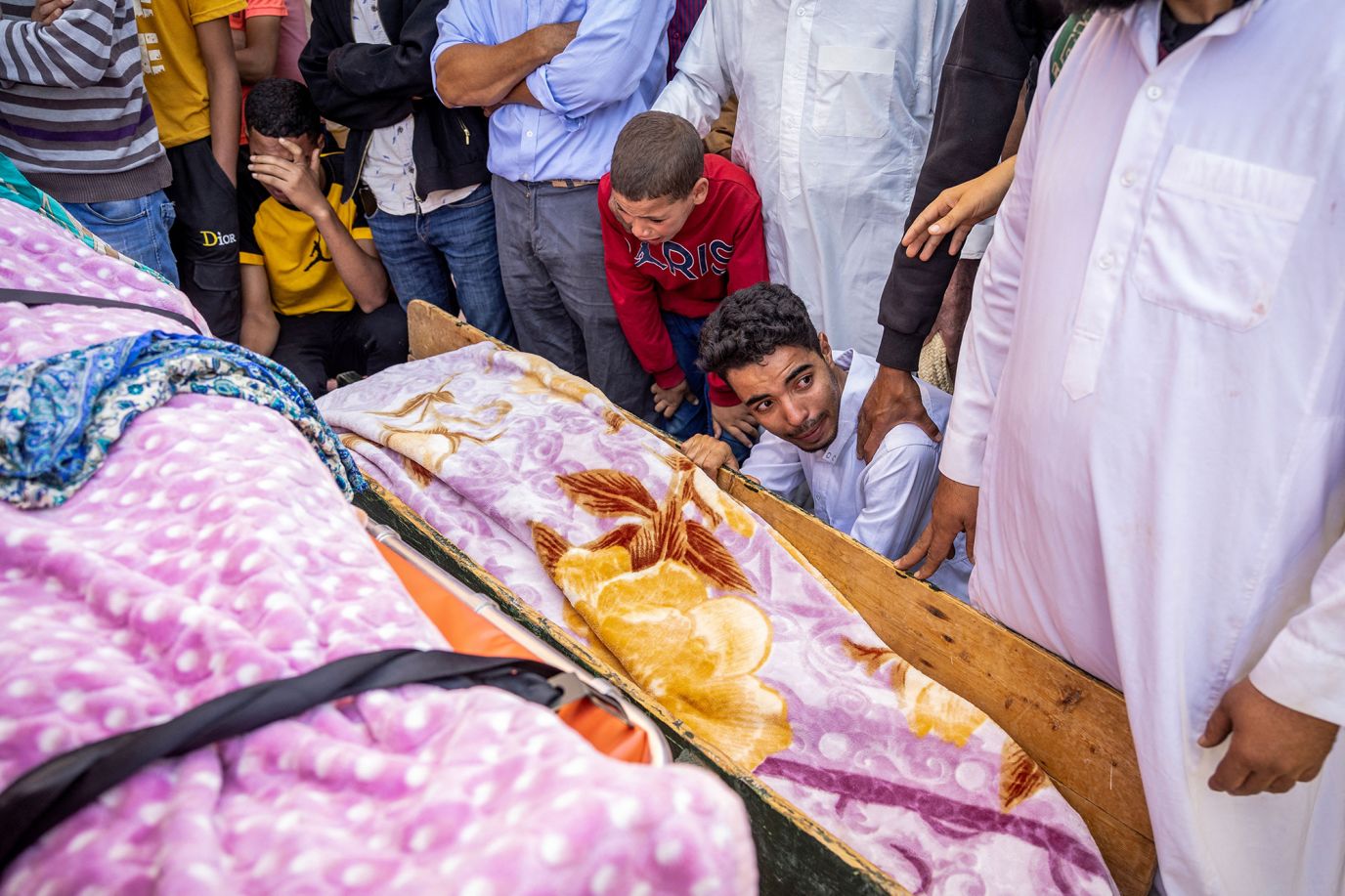 People mourn earthquake victims in Moulay Brahim, Morocco, on September 9.